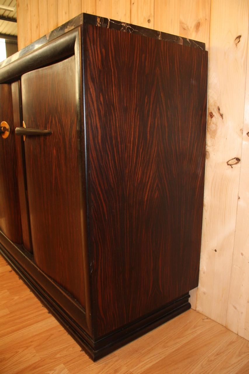 Art Deco period sideboard in macassar veneer and portor marble in good condition, minimal signs of wear and use.