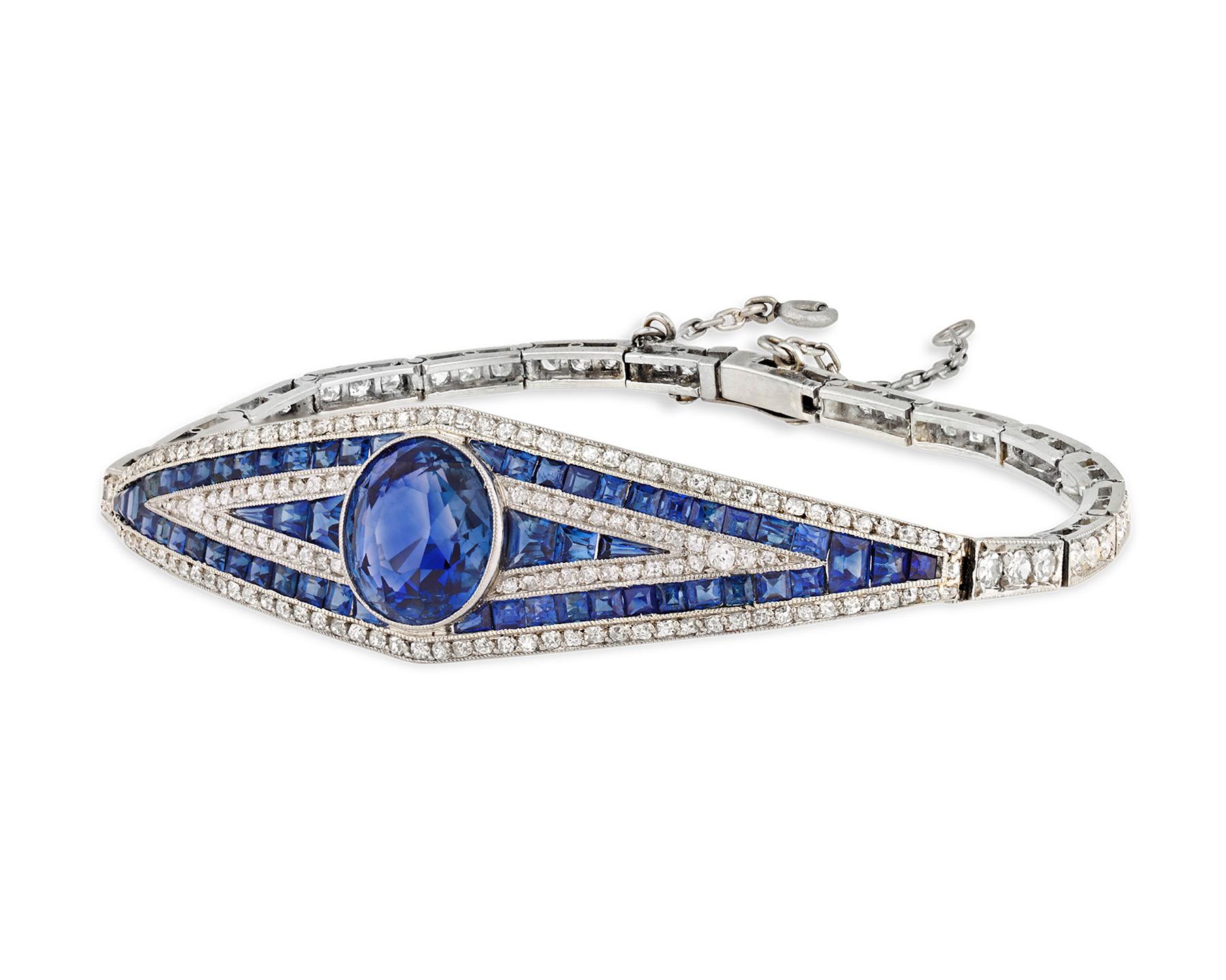 The chic sophistication and glamour of the Art Deco period comes alive in this breathtaking sapphire and diamond bracelet. An impressive 4.00 combined carats of royal blue Ceylon sapphires spun amid dozens of sparkling white diamonds. Crafted of