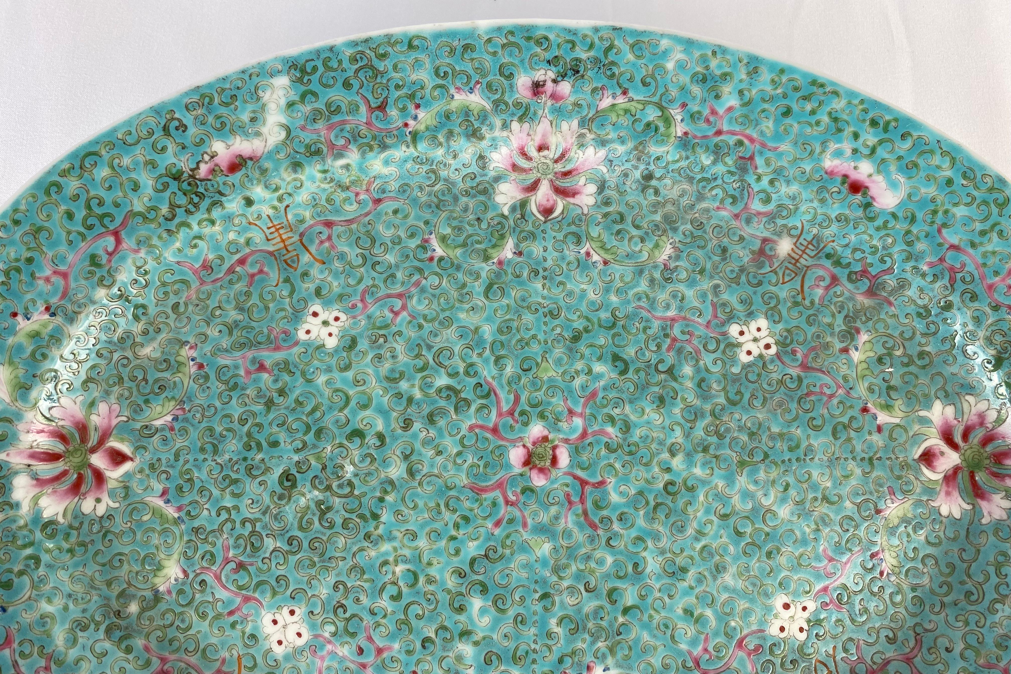 An exquisite Art Deco period Chinese Famille Rose porcelain bowl or small platter hand-painted and featuring over-glaze enamels. The strong color palette and rich decoration are hallmarks of Chinese export hunt bowls of the 18th century. 

The shape