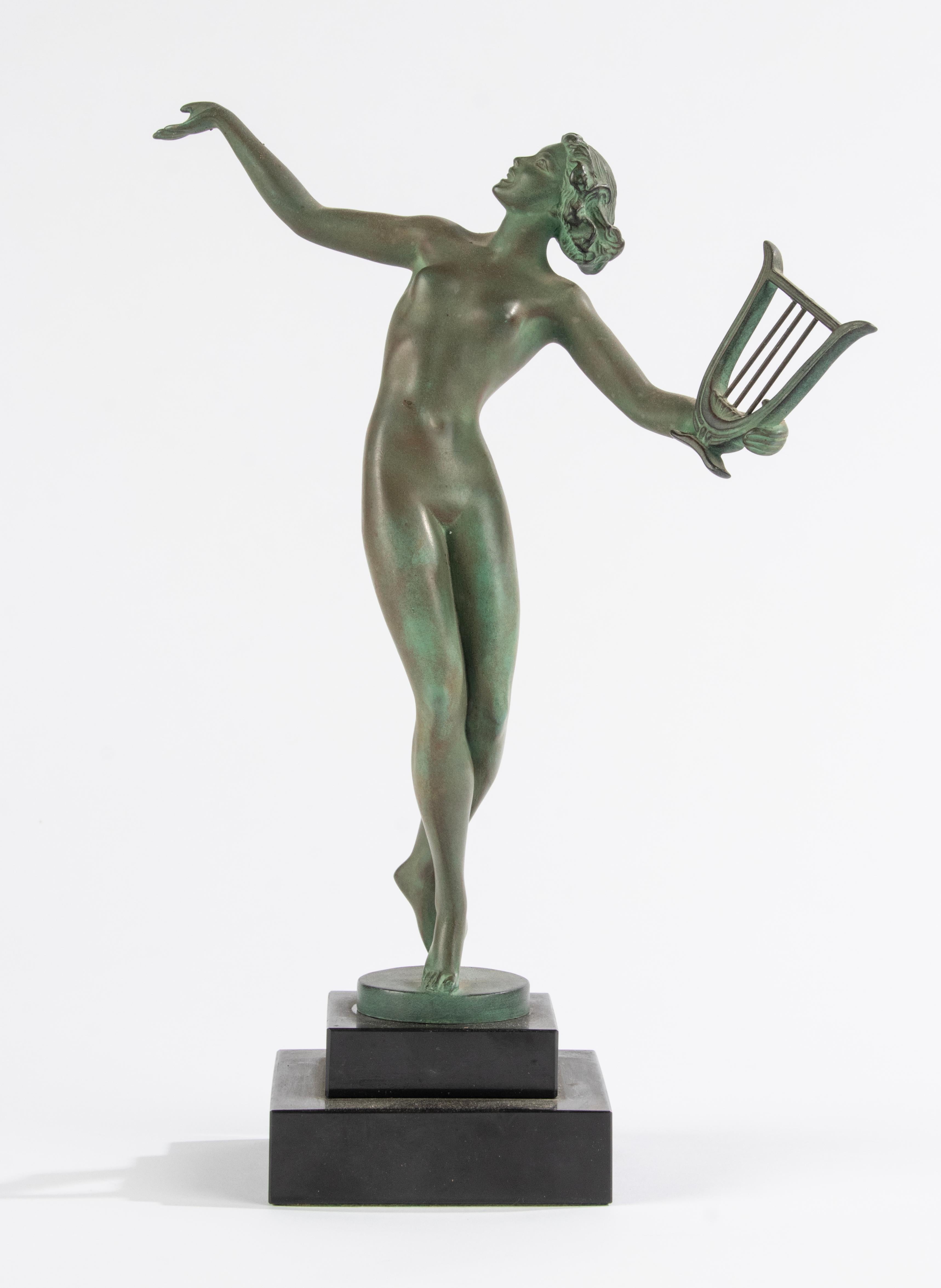 French Art Deco Period Green Patinated Spelter Sculpture Woman with Harp For Sale