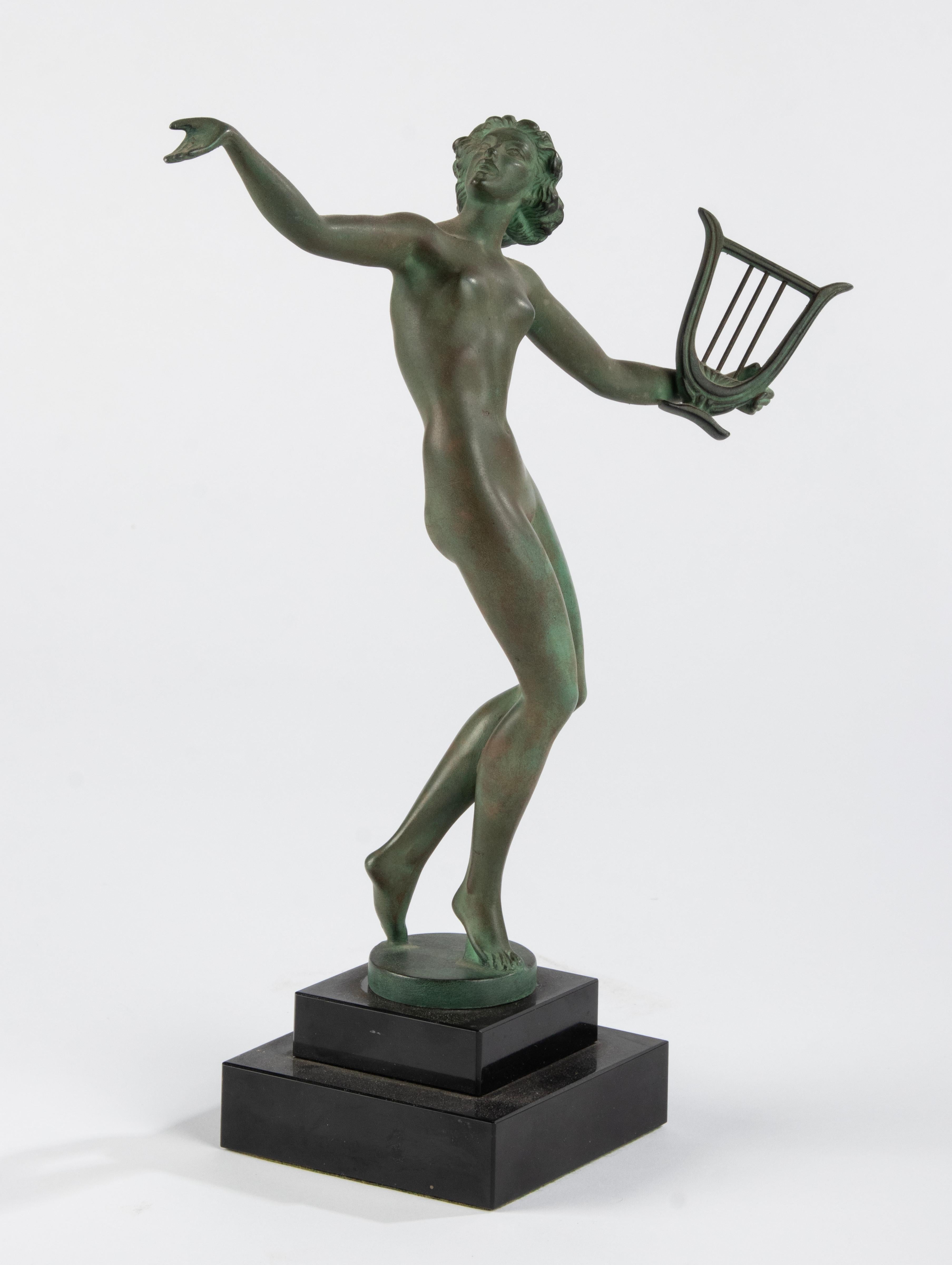Early 20th Century Art Deco Period Green Patinated Spelter Sculpture Woman with Harp For Sale