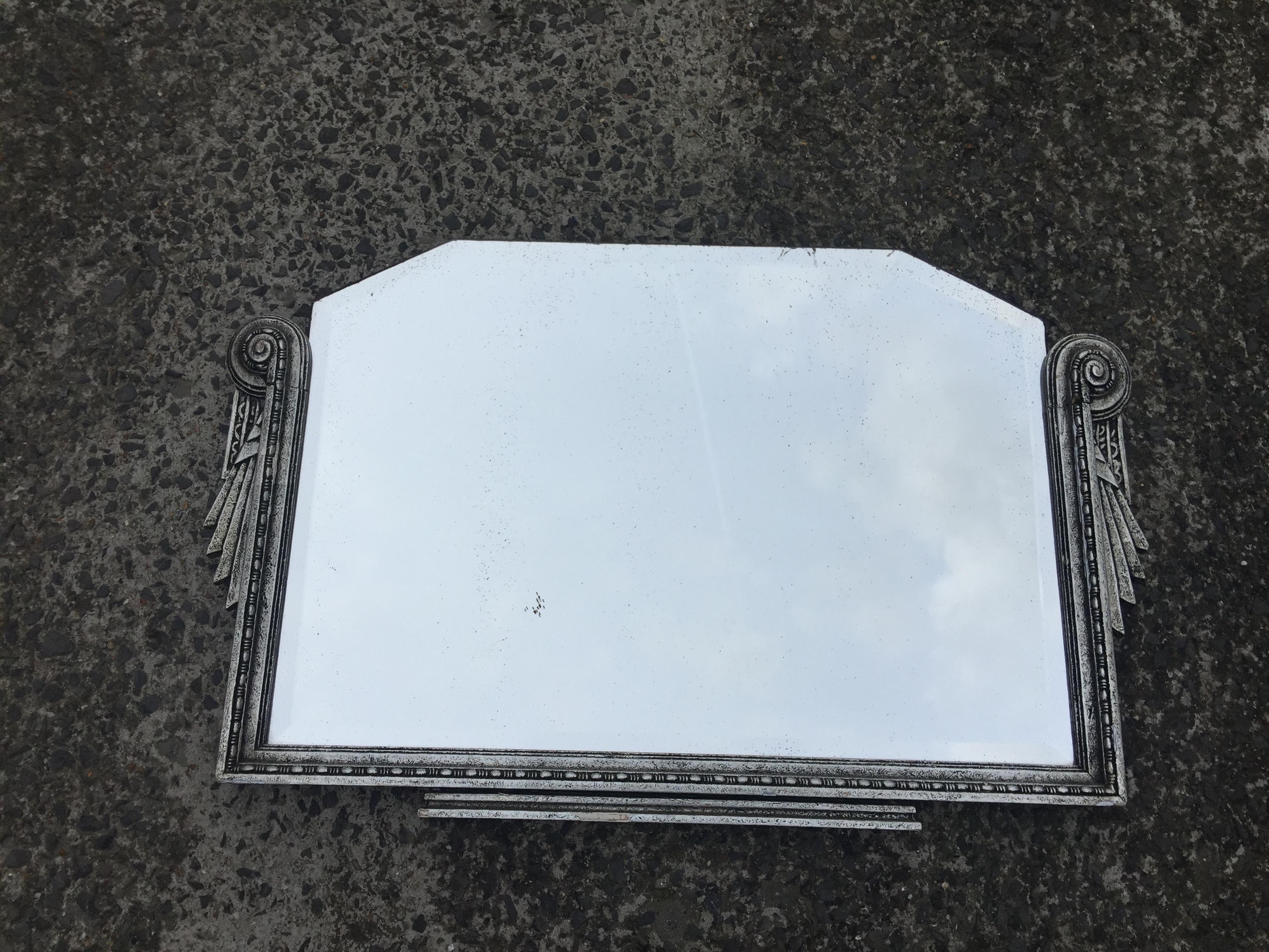 Art deco period mirror in carved and silvered wood
around 1930
good condition.