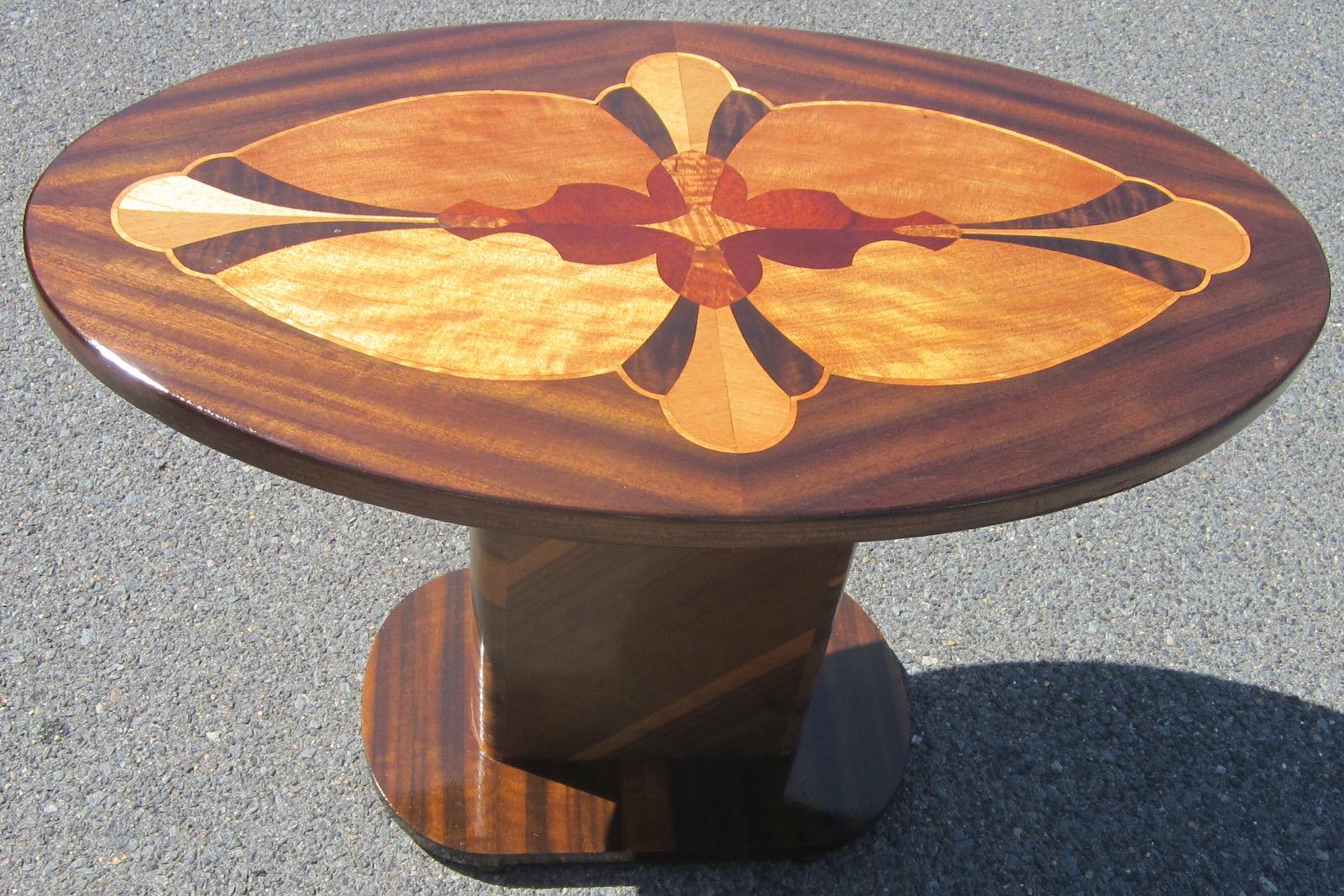 Art Deco period occasional table, 
inlaid with a range of Australian timbers, including walnut, cedar and satinwood.
has just been restored.
 