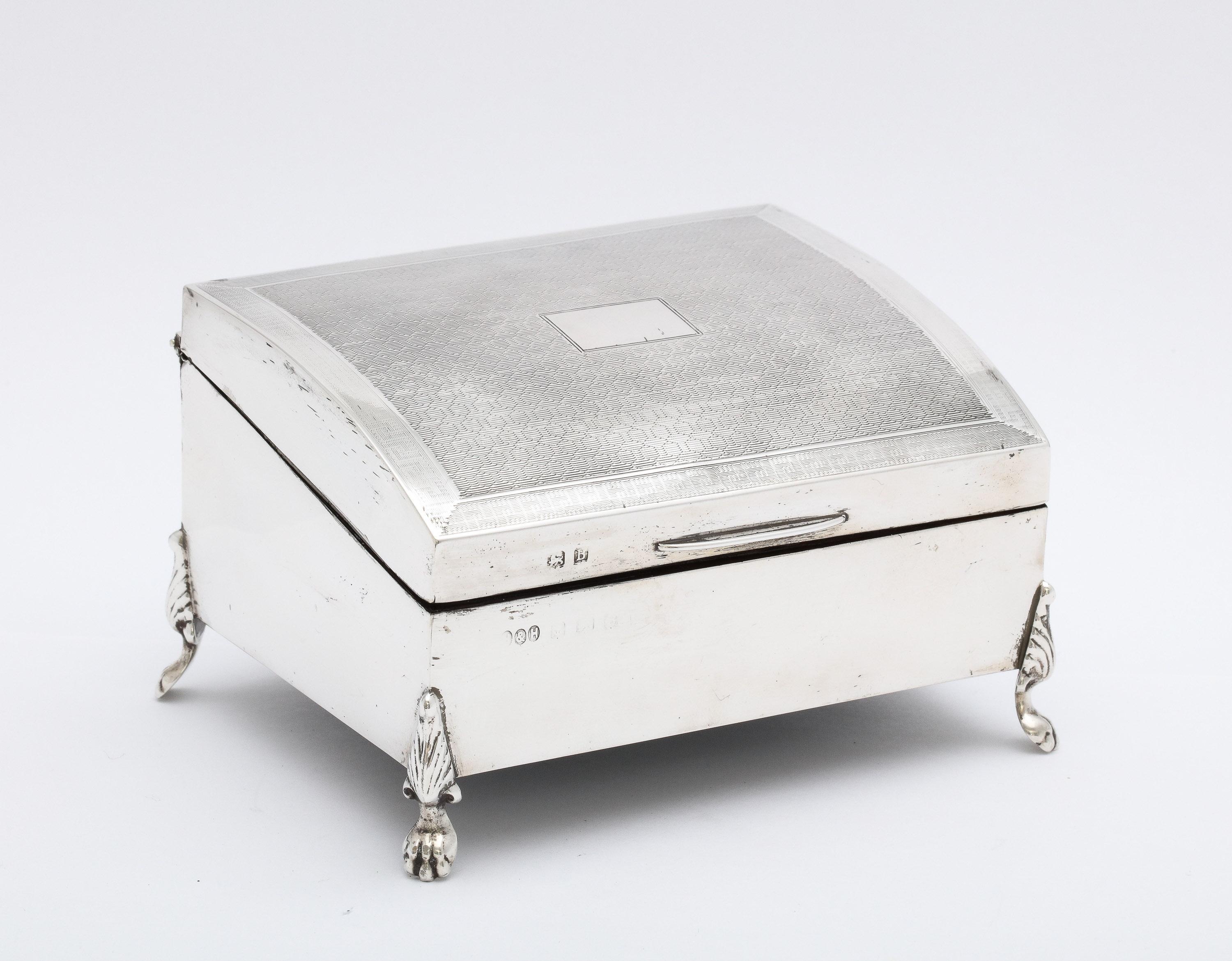 Art Deco Period, sterling silver, paw-footed, engine-turned-designed table box with with hinged lid, Birmingham, England, year-hallmarked for 1926, Hollings and Hutchinson - makers. Box is wood-lined. The wood is fitted on a slant to follow the form