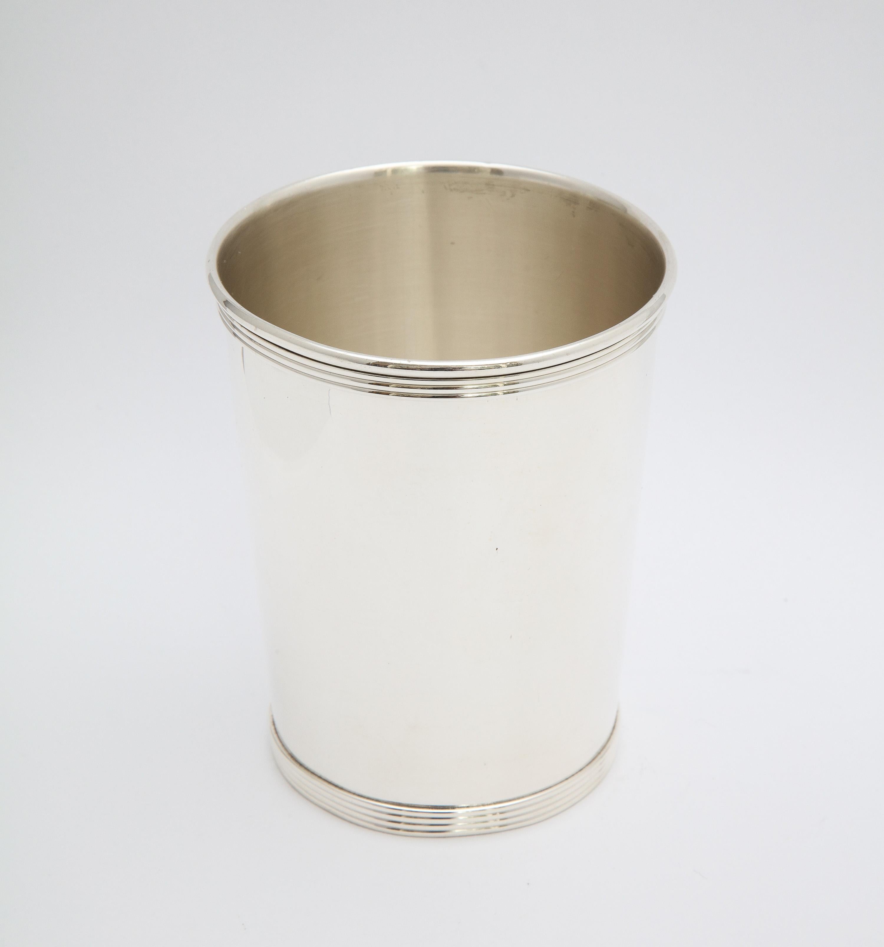 Art Deco period, sterling silver mint julep cup, The Alvin Corporation, Providence Rhode Island, Ca. 1930's. Measures: 3 3/4 inches high x 3 1/16 inches diameter across opening x 2 1/2 inches diameter across base. Weighs 3.820 troy ounces. Dark
