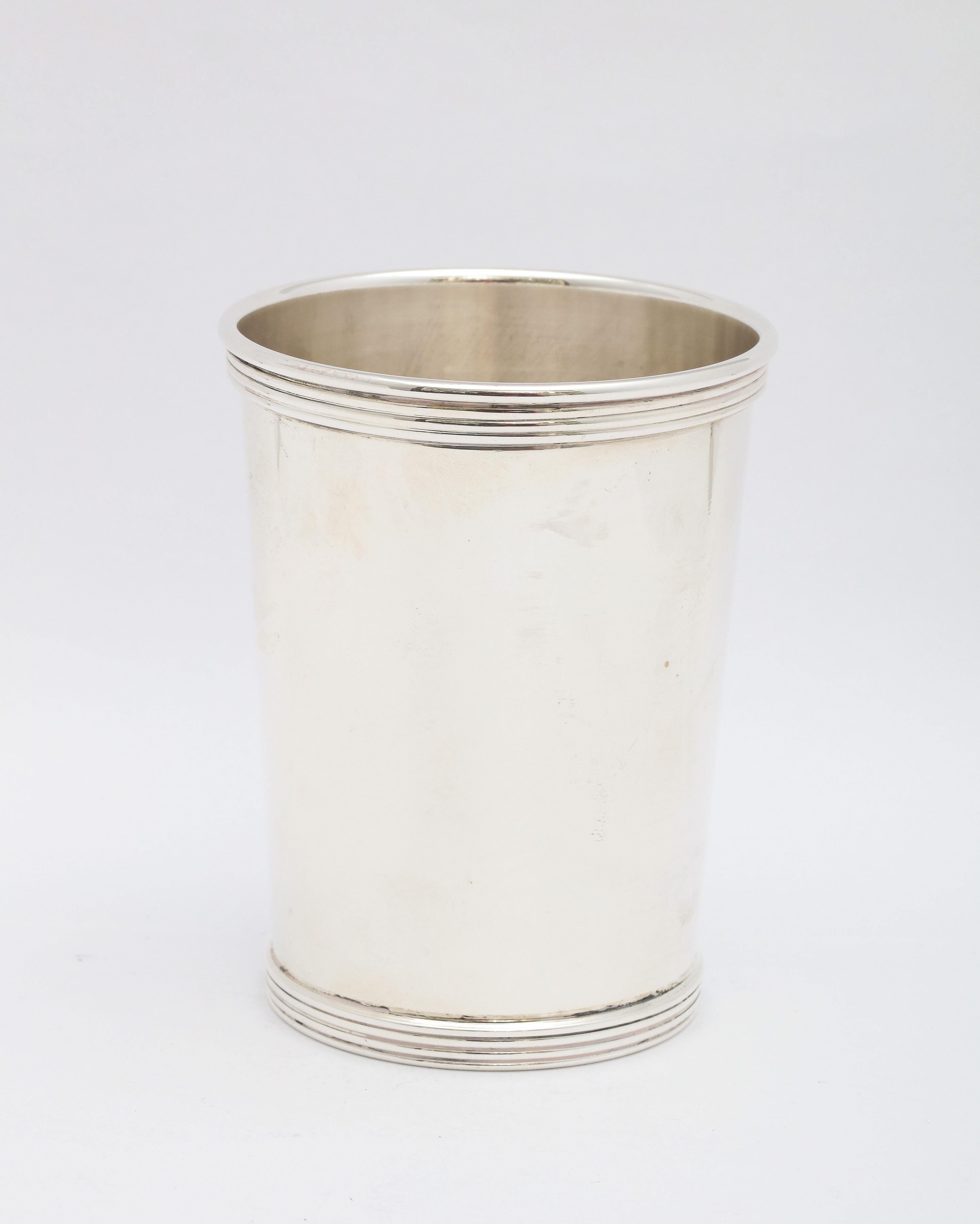 Art Deco Period, sterling silver mint julep cup, International Silver Co., Meriden, Ct., circa 1930s.Measures almost 4 inches high x over 3 inches diameter (at widest point). Weighs 3.945 troy ounces. Lightly gilt interior. Dark areas on sterling