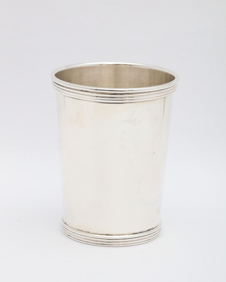 Art Deco Period, sterling silver mint julep cup, International Silver Co., Meriden, Ct., circa 1930s.Measures almost 4 inches high x over 3 inches diameter (at widest point). Weighs 3.945 troy ounces. Lightly gilt interior. Dark areas on sterling