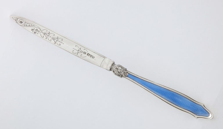 Art Deco period, sterling silver-mounted blue enamel letter opener/paper knife, Chester, England, year-hallmarked for 1922, H.E. and F.E. Barker of Barker Brothers, Ltd - makers. Measures almost 3/4 inches deep x 1/2 inch high (at highest point when