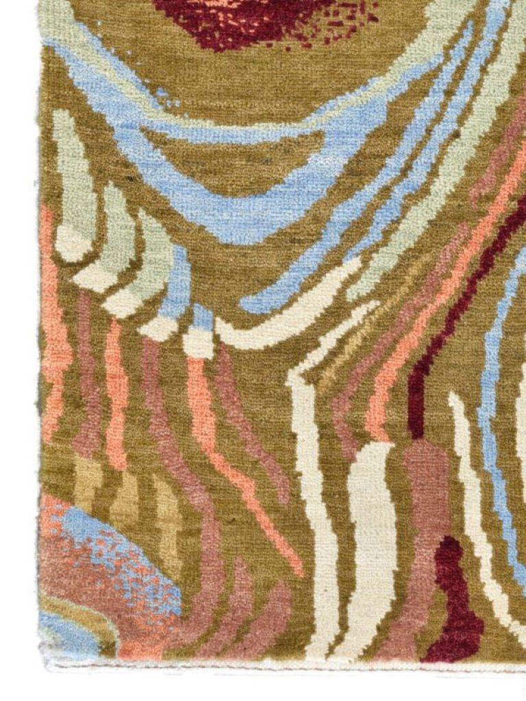 This Art Deco Persian Carpet by Orley Shabahang in brown, blue, pink, red and green measures 4' x 6.' Utilizing vibrant organic dyes, this hand-knotted wool carpet, titled 