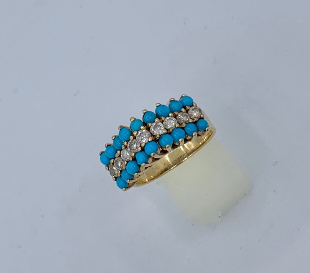 This is a gorgeous Antique Retro - Art Deco Ring with 18 natural Persian Turquoise cabochons of stunning beauty with 9 sparkling white Diamonds set in a 14 Karat Yellow Gold pyramid design.  The combination of Persian Turquoise and sparkling white
