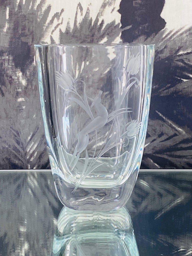 1930's Swedish Art Deco blown crystal vase with thick polished rounded edges and slightly tapered form. Vase has stunning hand-etched designs depicting stylized foliage and a leaping doe. Makes a chic accessory to any table top or desk top. 

Very
