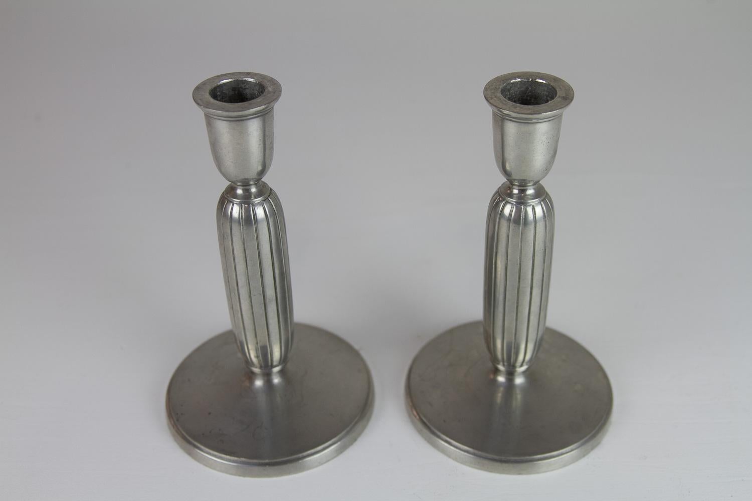 Art Deco Pewter Candle Holders by Just Andersen, 1930s. Set of 2.
Wonderful pair of pewter candlesticks designed by Danish sculptor Just Andersen in Denmark in the 1930s.
Stamped with makers mark and serial number 2574.
Very good original condition.