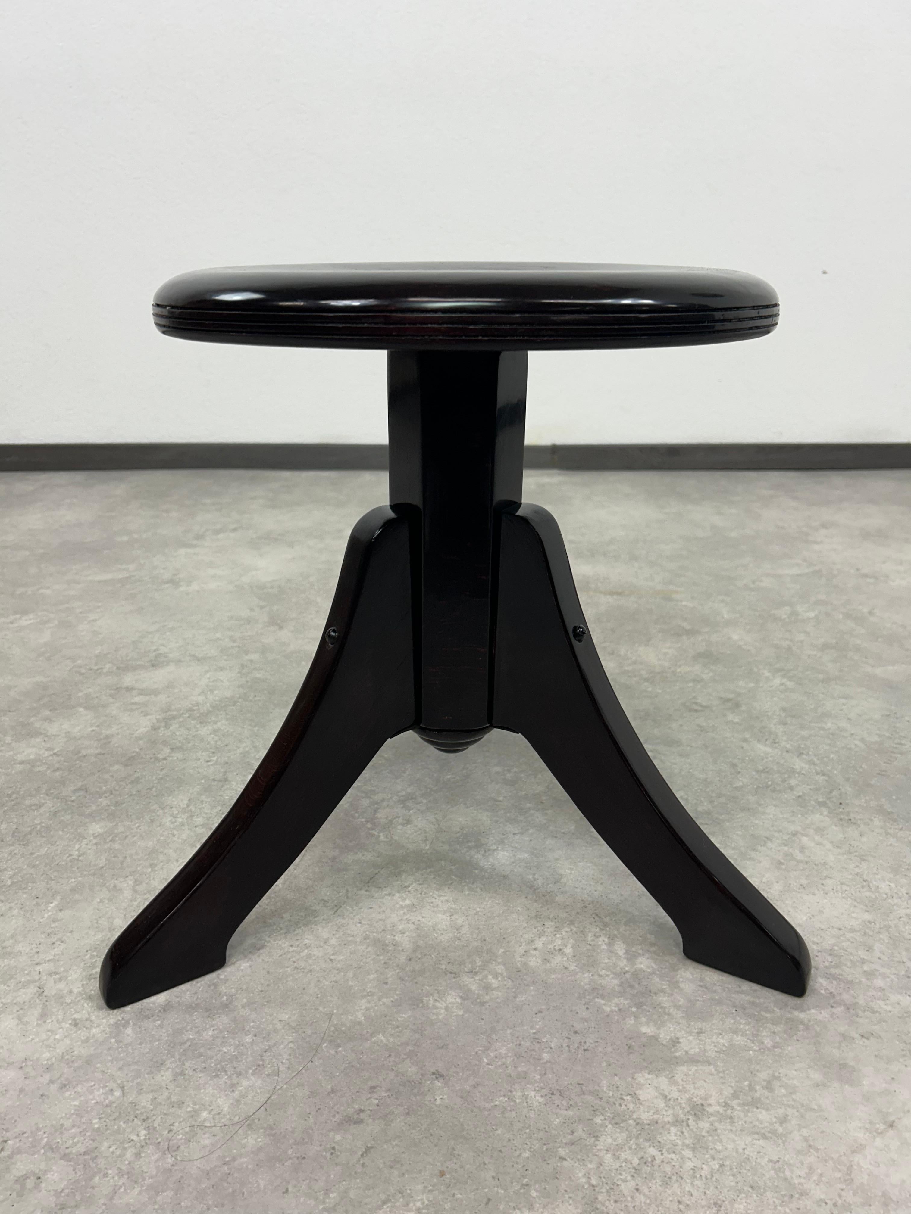 Art deco piano chair. Professionally stained and repolished.
