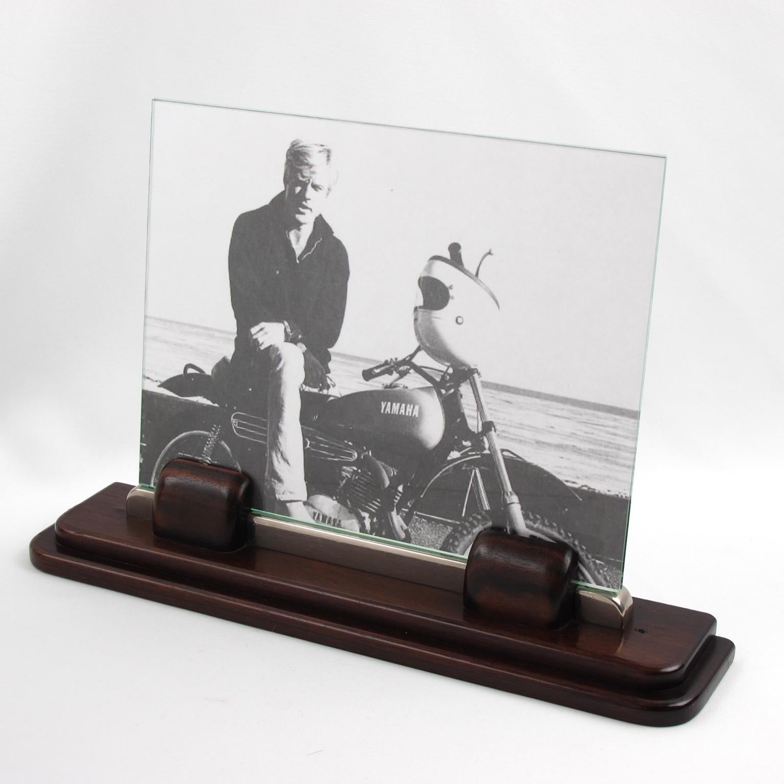 A charming Art Deco modernist picture photo frame, featuring thick hand-rubbed Macassar wood plinth compliment with same wood holders and ornate with Industrial thick chrome stick attached by visible chromed screws. The frame is complete with its