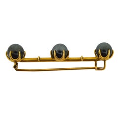 Spilla Art Deco con tre sfere di ematite realizzate a mano in oro rosa massiccio