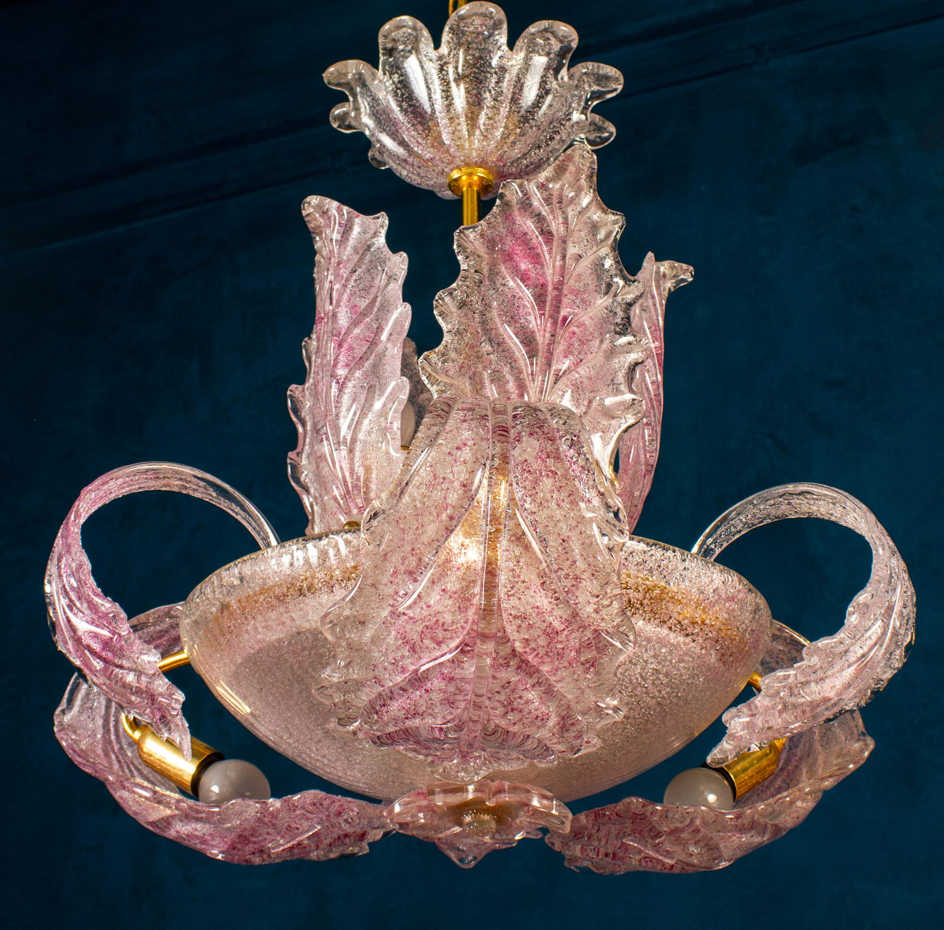 Charming Pink hand blown Murano glass chandelier.
Excellent vintage condition.
6 E 14 light bulbs.
Cleaned and re-wired, in full working order and ready to use. In excellent vintage condition. The leaves, all original and in good condition, are