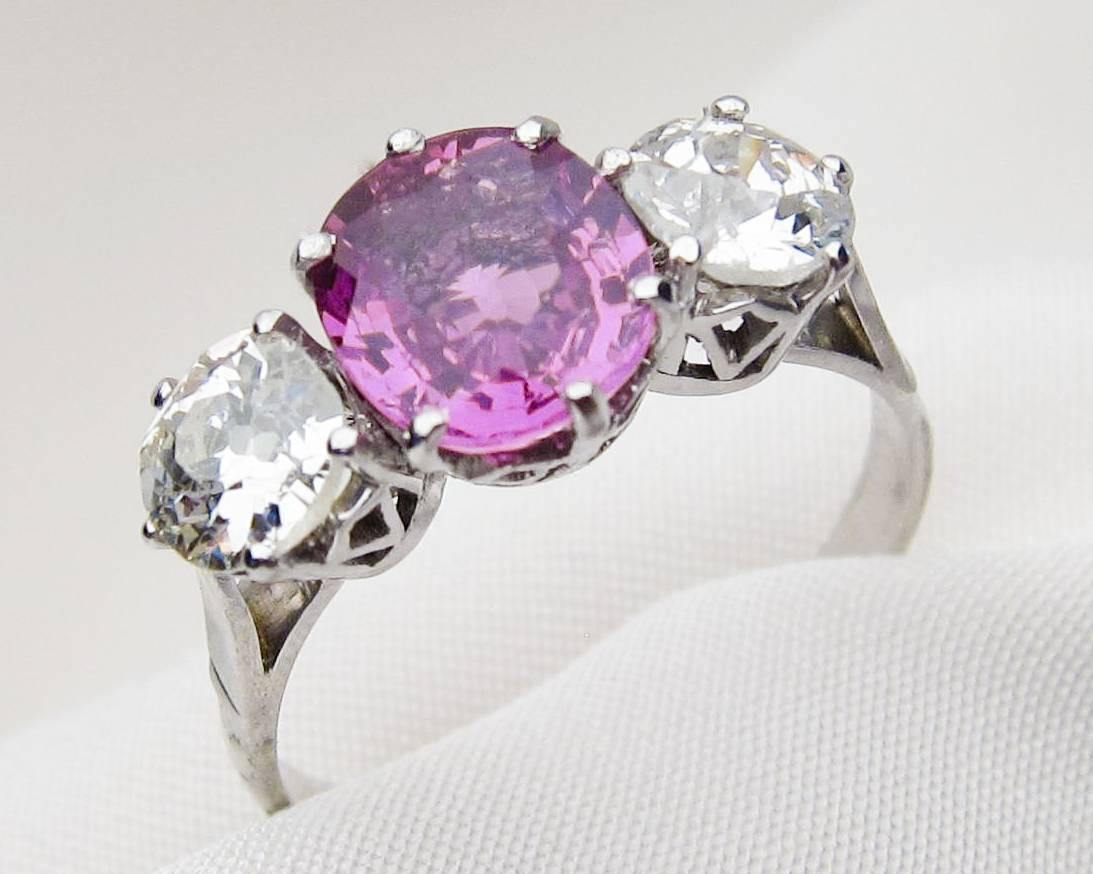 Old European Cut Art Deco Pink Sapphire and Diamond Three-Stone Platinum Linear Ring For Sale