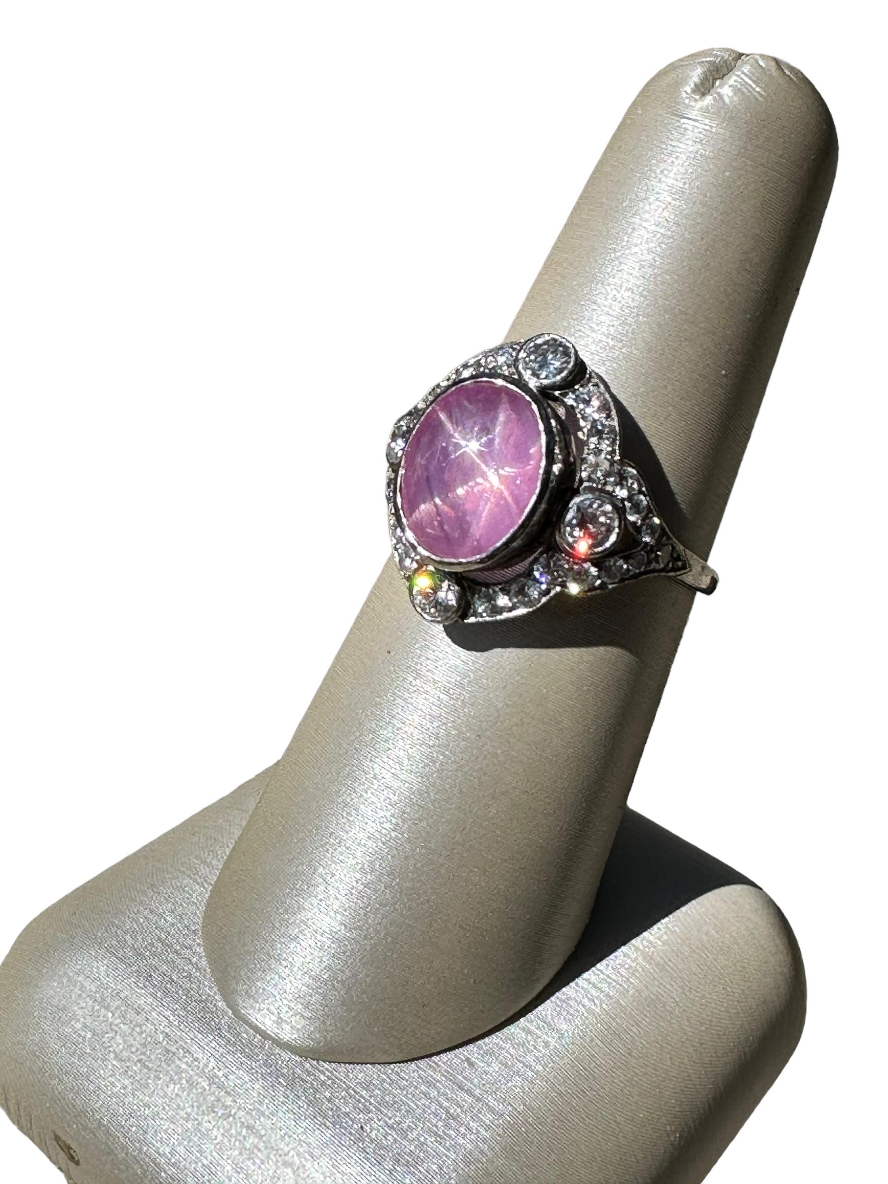 Stunning 1930's Art Deco Pink Star Sapphire and Diamond Dinner - or Cocktail - Ring (cocktails first, then dinner!).

The Art Deco platinum mounting is as perfect as it gets. The ring dates from the 1930's and is truly one to admire. The pink