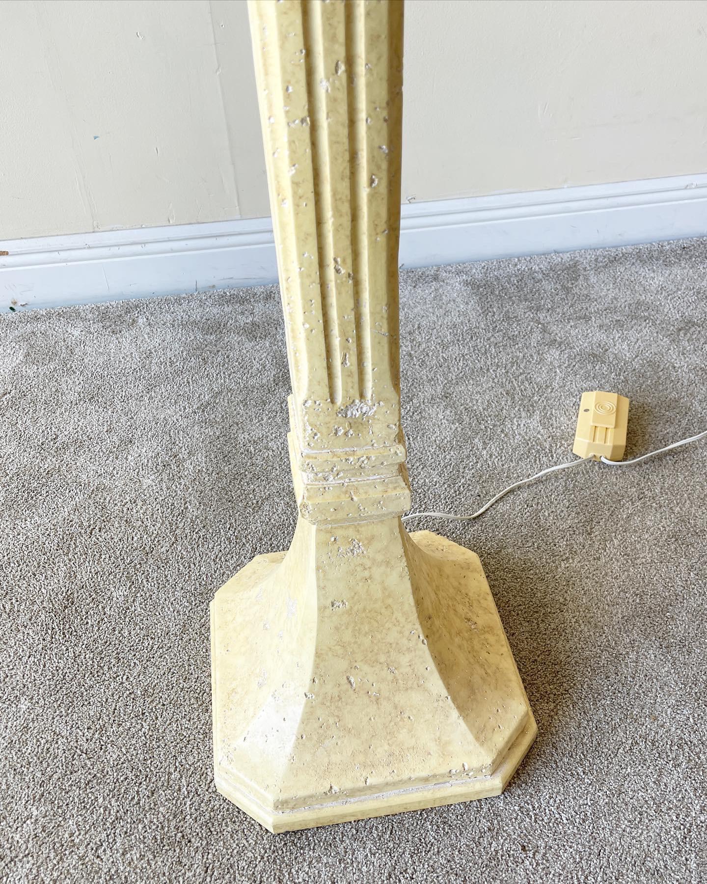 Exceptional plaster torchiere lamp. Square bad and top, finished with a light yellow. By pacific coast lighting.
 