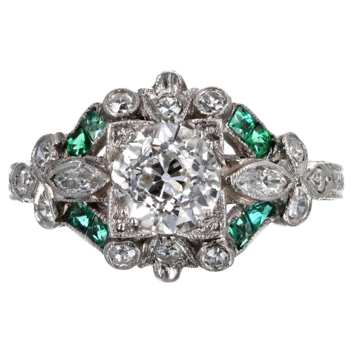 Anillo Art Decó de platino con diamante talla europea antigua y esmeralda natural de 0,90 quilates