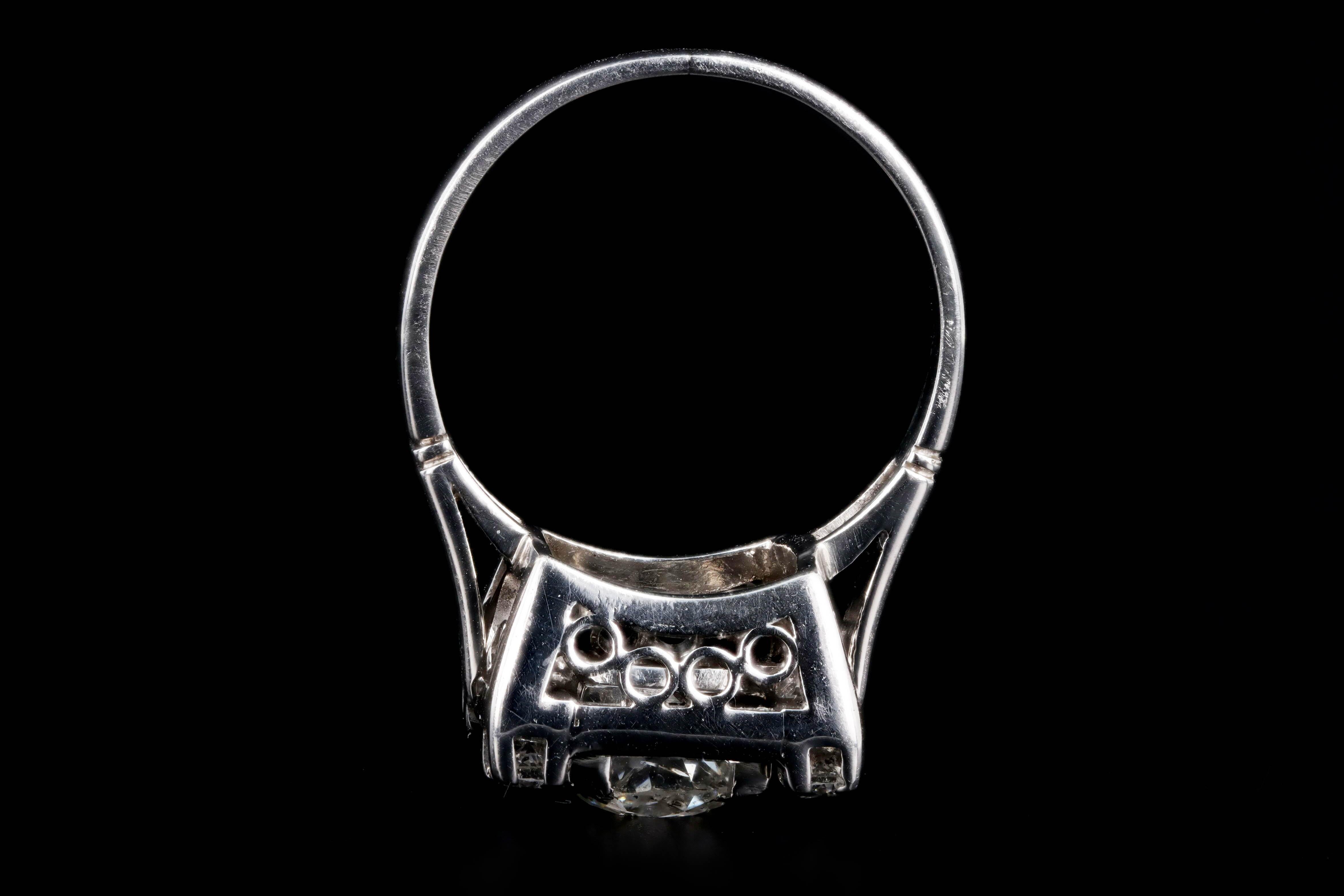 Women's Art Deco Platinum 1 Carat Old European Cut Diamond Baguette Halo Ring