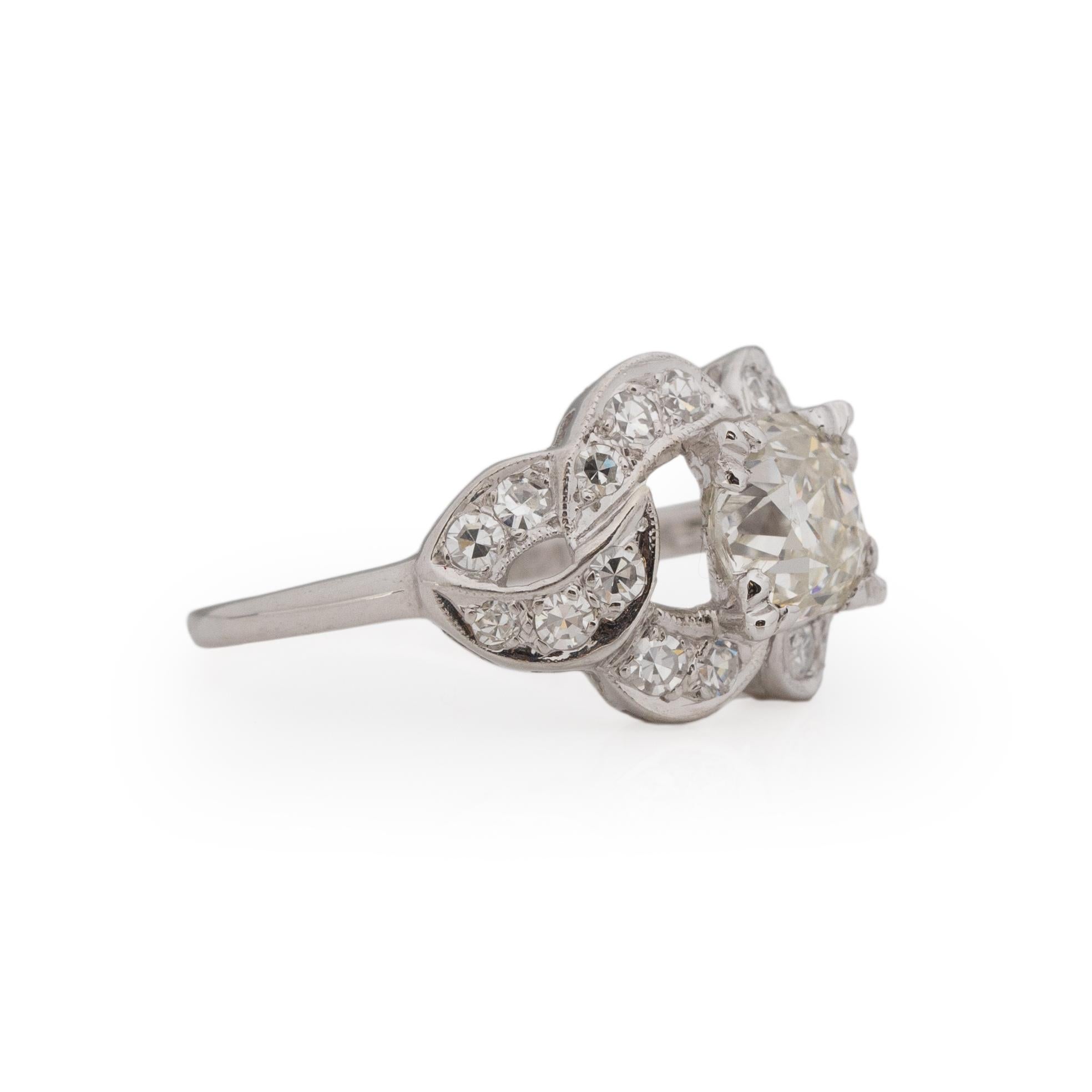 Here we have a beautifully unique piece. The top chain link design is crafted in platinum and the shank is 14K. The top surrounding design resembles a chain link, giving a unique over all look. Adorning the chain link design is 0.42 Cttw of single