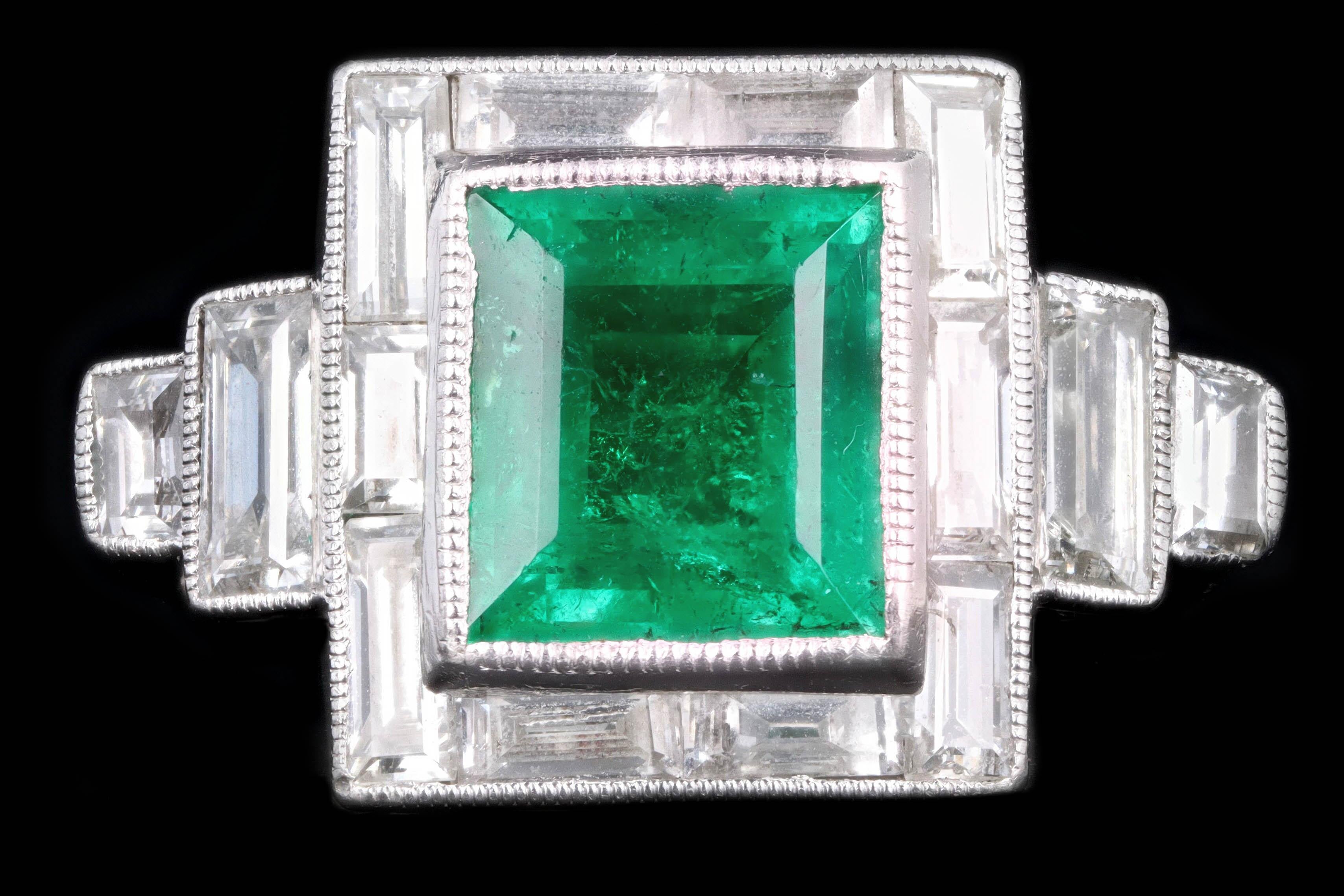 Era: Art Deco

Composition: Platinum 

Primary Stone: Natural Columbian Emerald 

Carat Weight: Approximately 1.80 Carats

Accent Stone: 14 Baguette Cut Diamonds 

Carat Weight: Approximately 1.25 Carats 

Color/ Clarity: F-G / VS1-2

Ring Size: