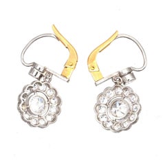 Pendientes colgantes Art Déco de platino y oro de 18 quilates con racimos de diamantes