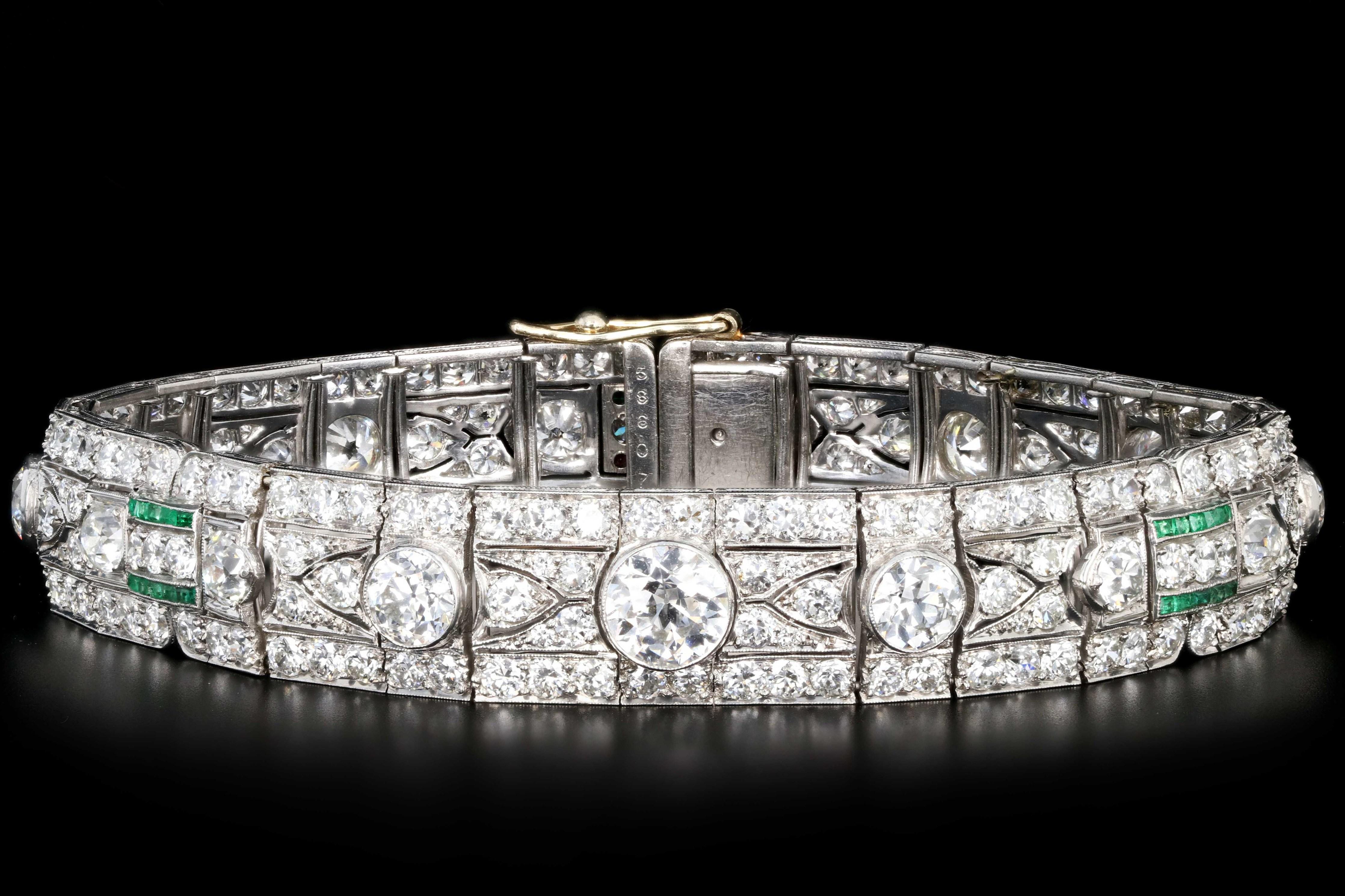 Era: Art Deco

Composition: Platinum

Primary Stone: Old European Cut Diamond

Primary Center Diamond Weight: 1.3 Carats

Accent Stone: Old European Cut Diamonds 

Accent Diamond Weight: (2) .90 Carats

                                            