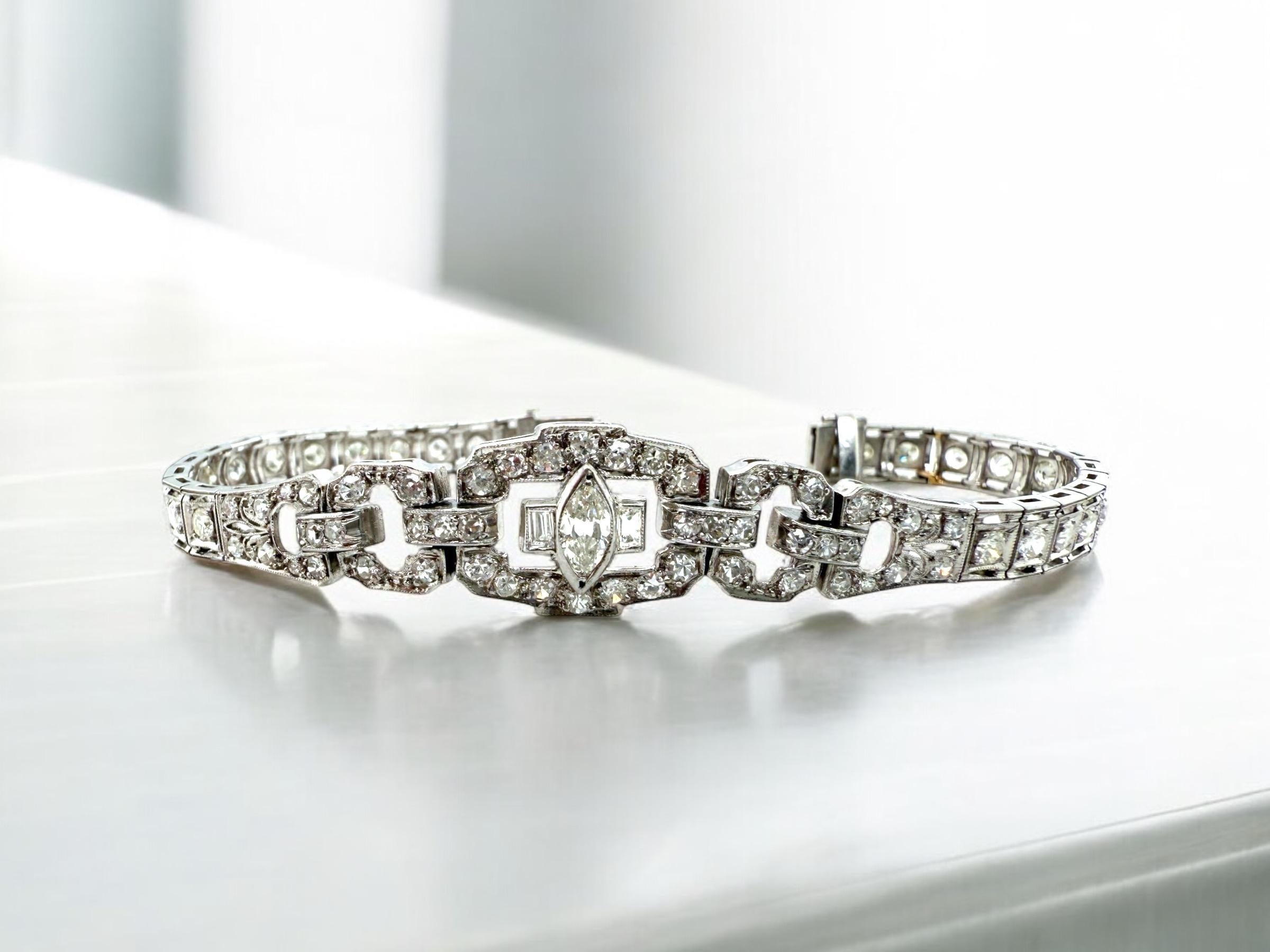 We are loving this vintage beauty!
She is sweet & perfect for everyday love.

Bracelet Details
Material: Platinum
Era: Art Deco 1920 - 1940
Weight: 16.6 Grams
Head Width: 12.8mm
Length: 6 1/2 Inches

Accented by the following gemstones
1 - 6mm X 3mm