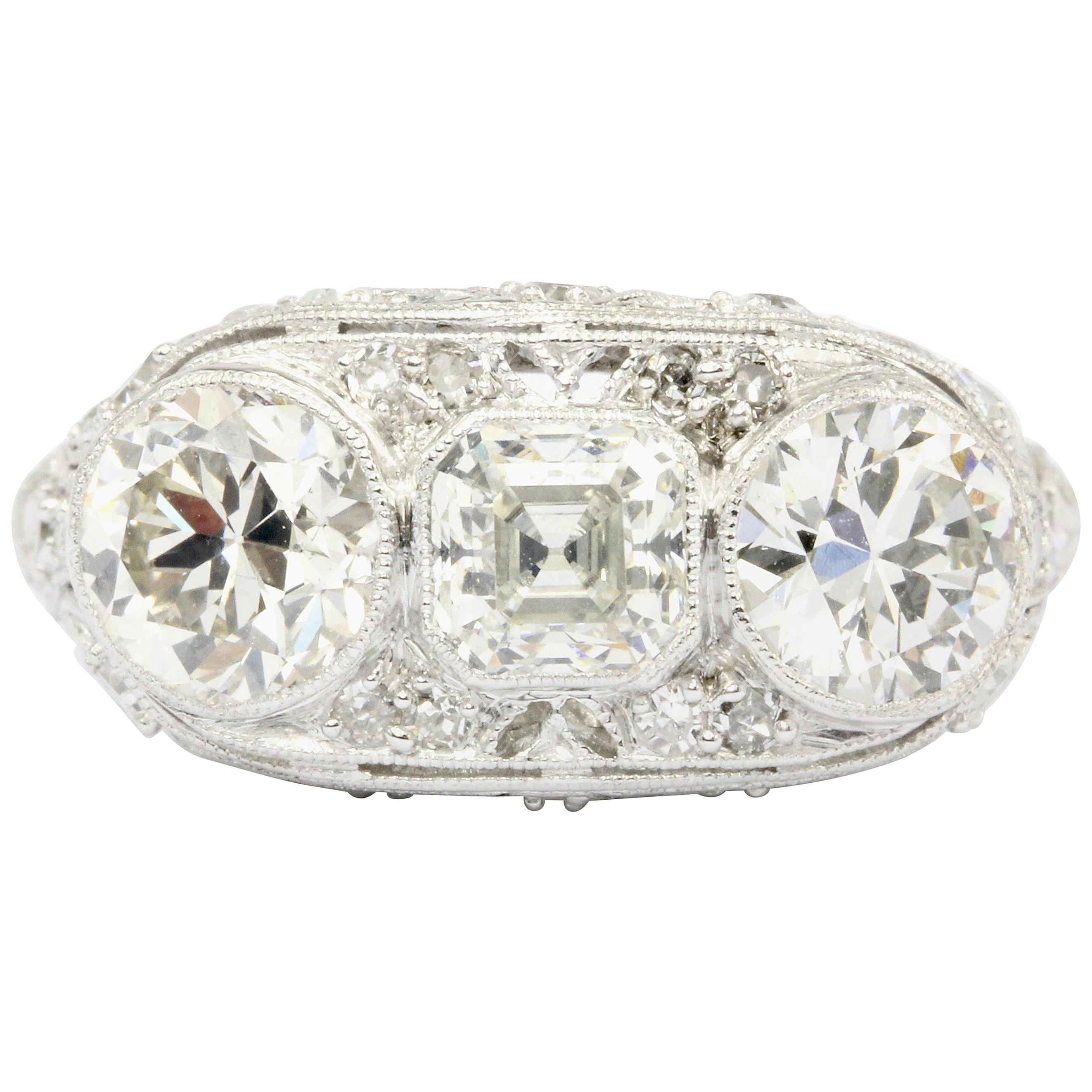 Art Deco Platinum 3-Stone Diamond Engagement Ring, circa 1930s