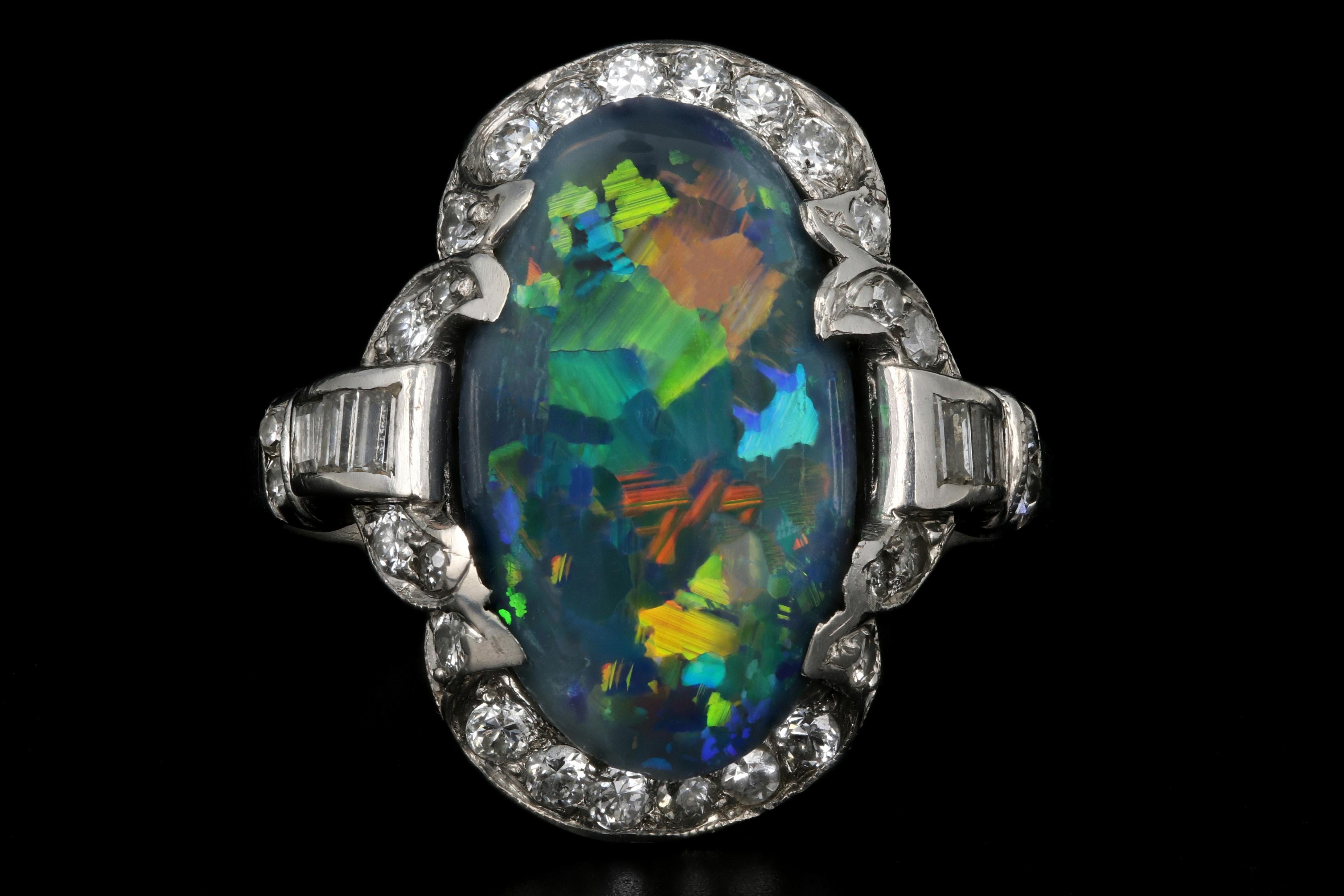 Era: Art Deco

Hallmarks: 10% IR, PLAT

Composition: Platinum

Primary Stone: Black Opal

Stone Carat Weight: Approximately 4 Carats

Accent Stone: Baguette and Round Cut Diamonds

Accent Stone Carat Weight: Approximately .50 Carats

Color/ Clarity: