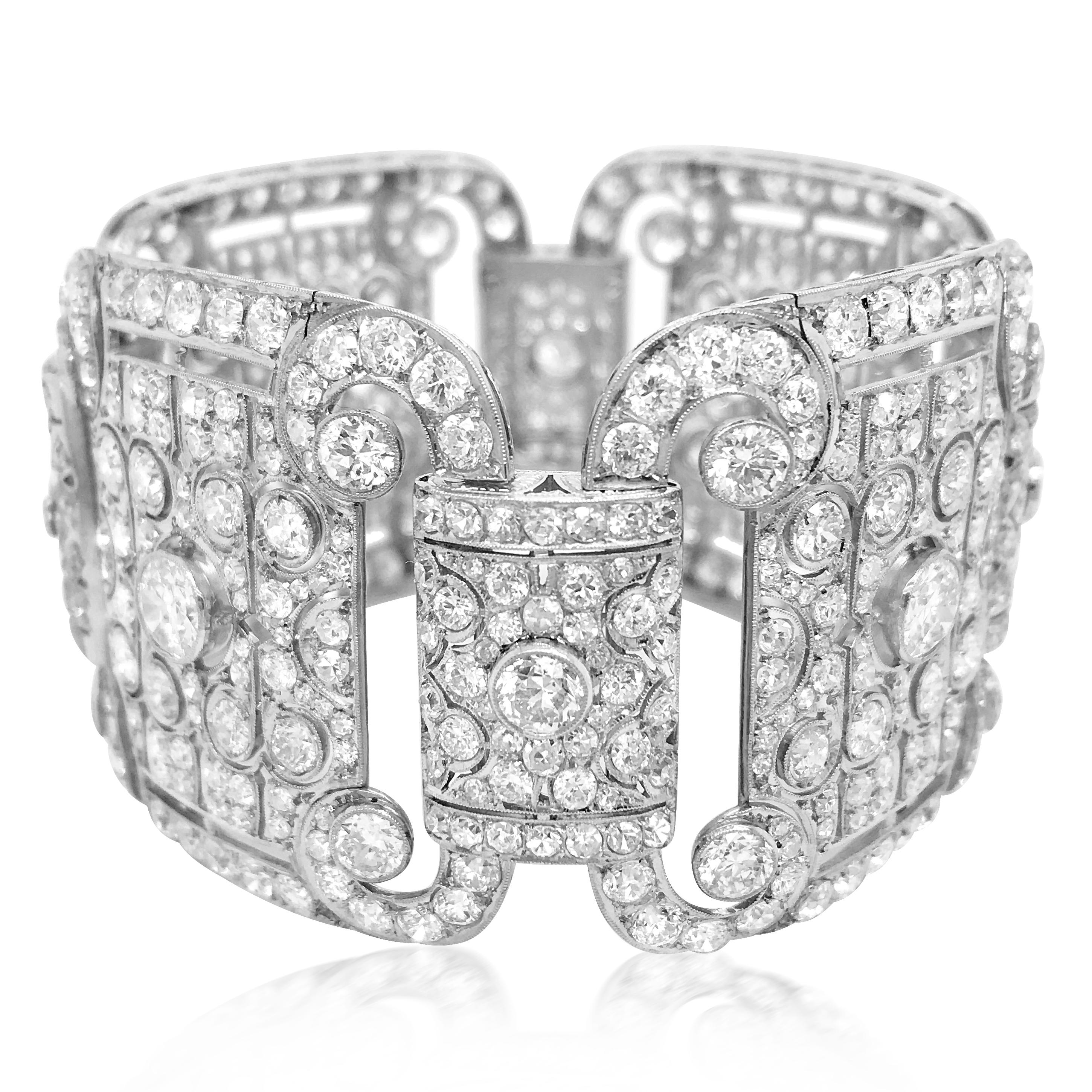 This captivating antique diamond link bracelet characterizing the most elegant wrist ornament is crafted in solid platinum, weighs 89.12 grams and measures 18cm (7.08 inches) long and 40mm (1.57 inches) wide. It incorporates four quintessentially