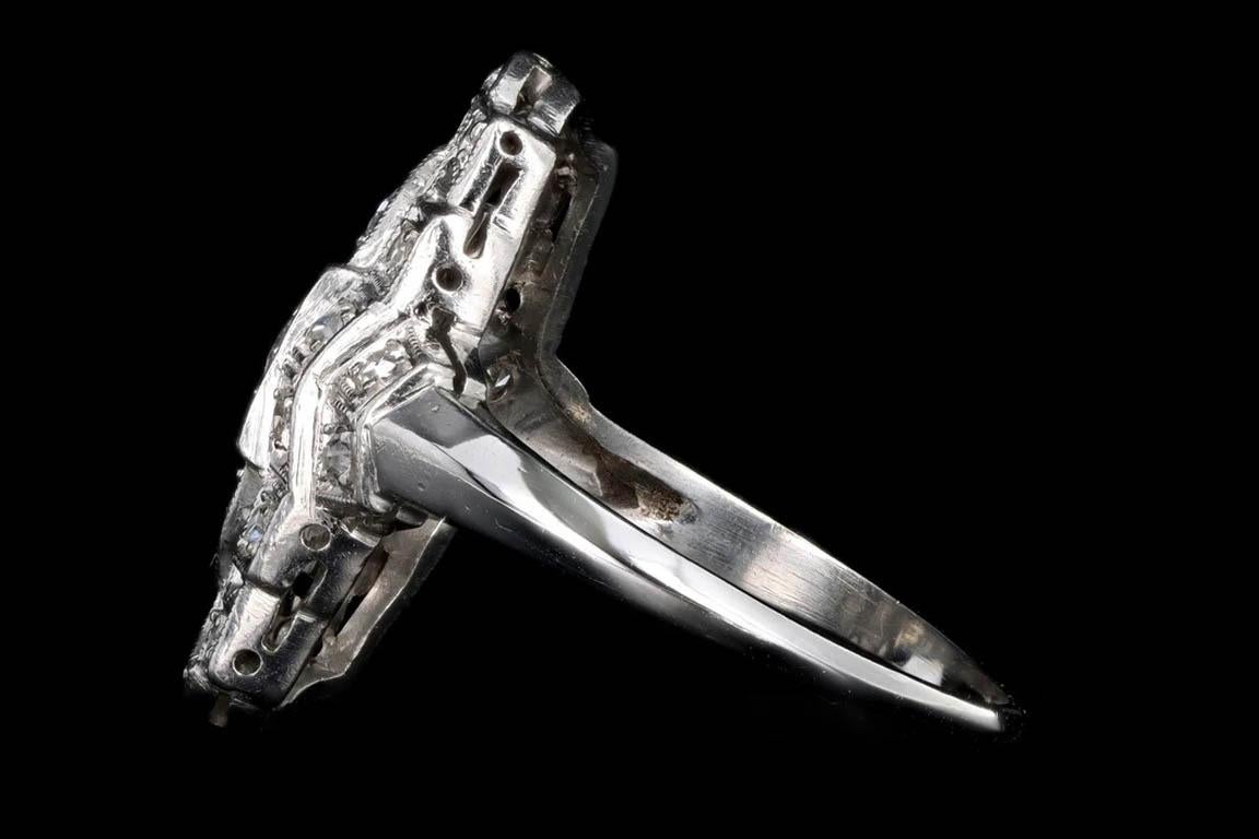Art deco platinum .50 carat total weight old european cut diamond shield ring

Era: Art Deco
Composition: Platinum
Primary Stone: Old European Cut Diamond
Carat Weight: Approximately .15 Carats
Accent Stone: Old European Cut & Single Cut