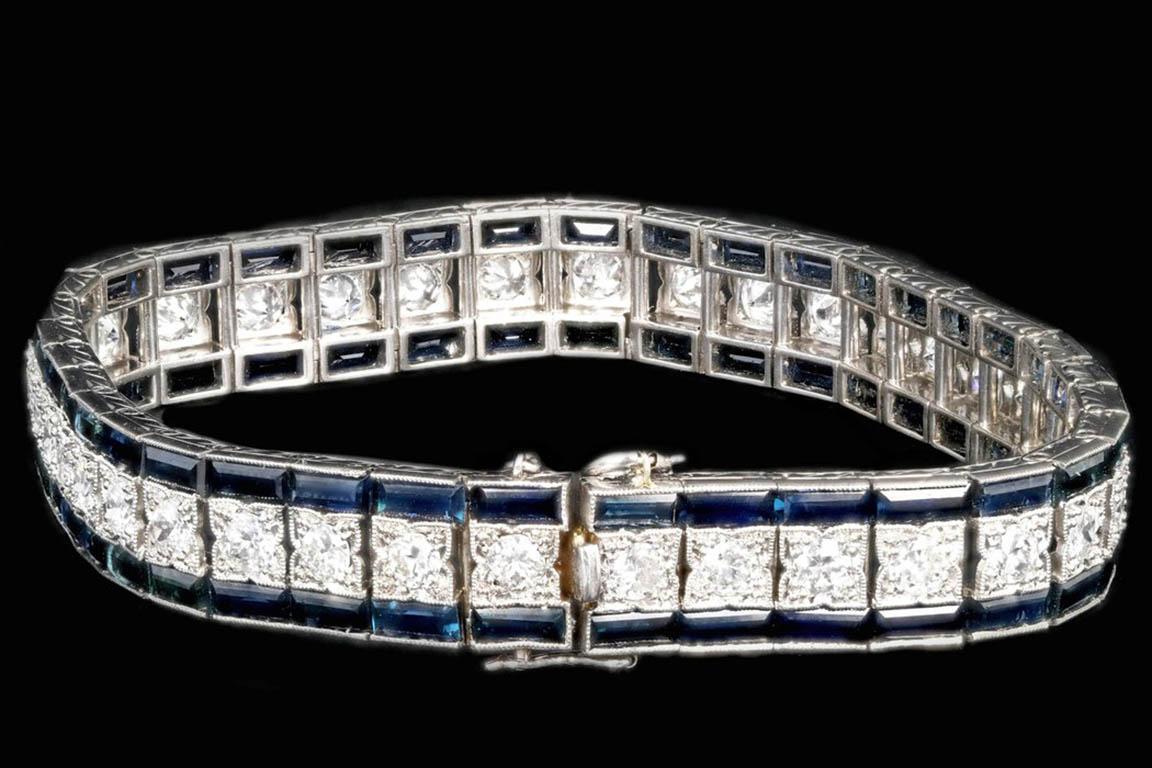 Art deco platinum 6 cts sapphire and 4.5 cts old european cut diamond bracelet

Era: Art Deco
Composition: Platinum
Primary stone: baguette cut Natural sapphires
Sapphire Total carat weight: Approximately 6 carats
Accent stone: Old european cut