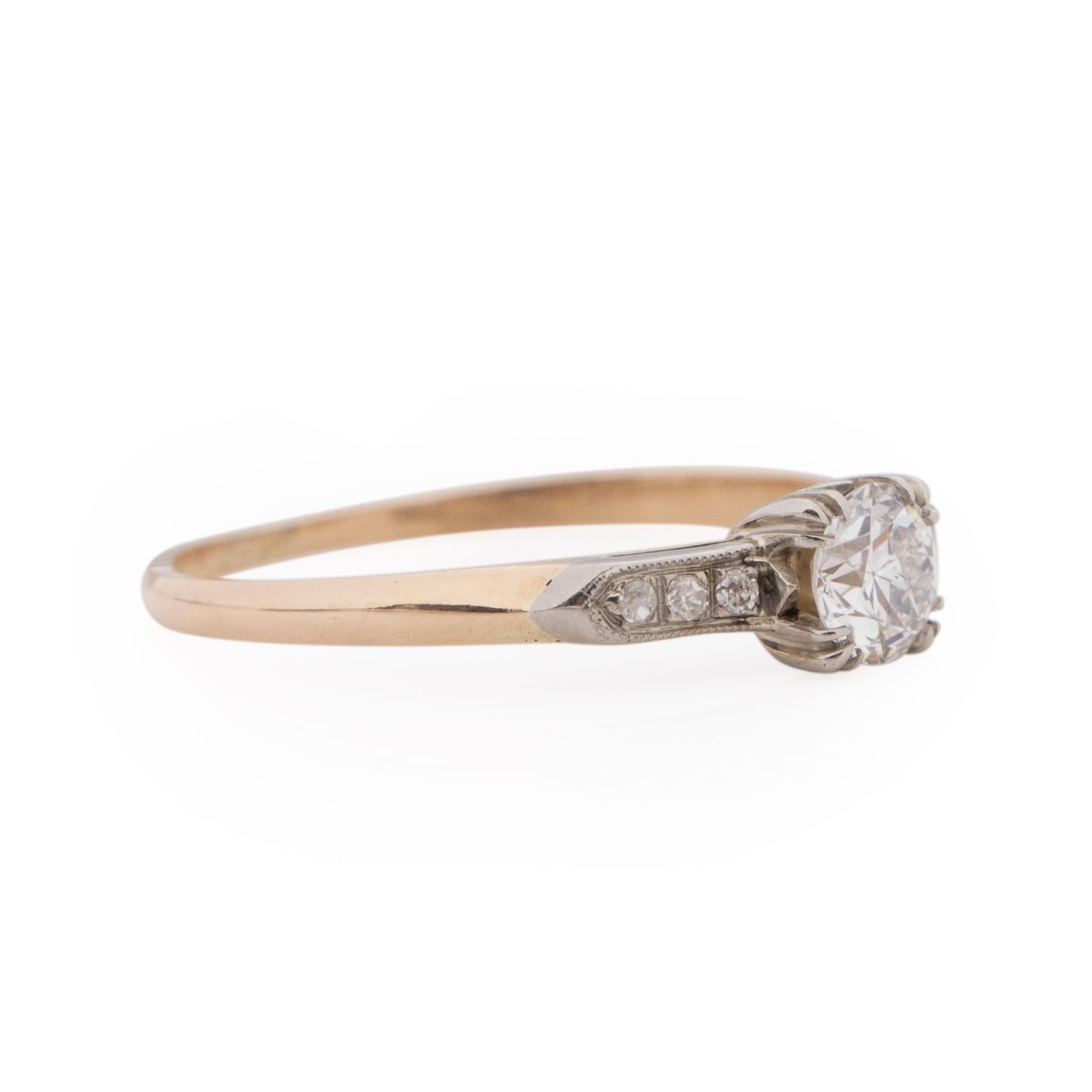 Here we have a elegant and classic art deco vintage solitaire two tone beauty. The two tone look makes the ring flexible to any metal type for the accenting wedding band. In the center is a .38 Ct old euro that has outstanding facets to catch the