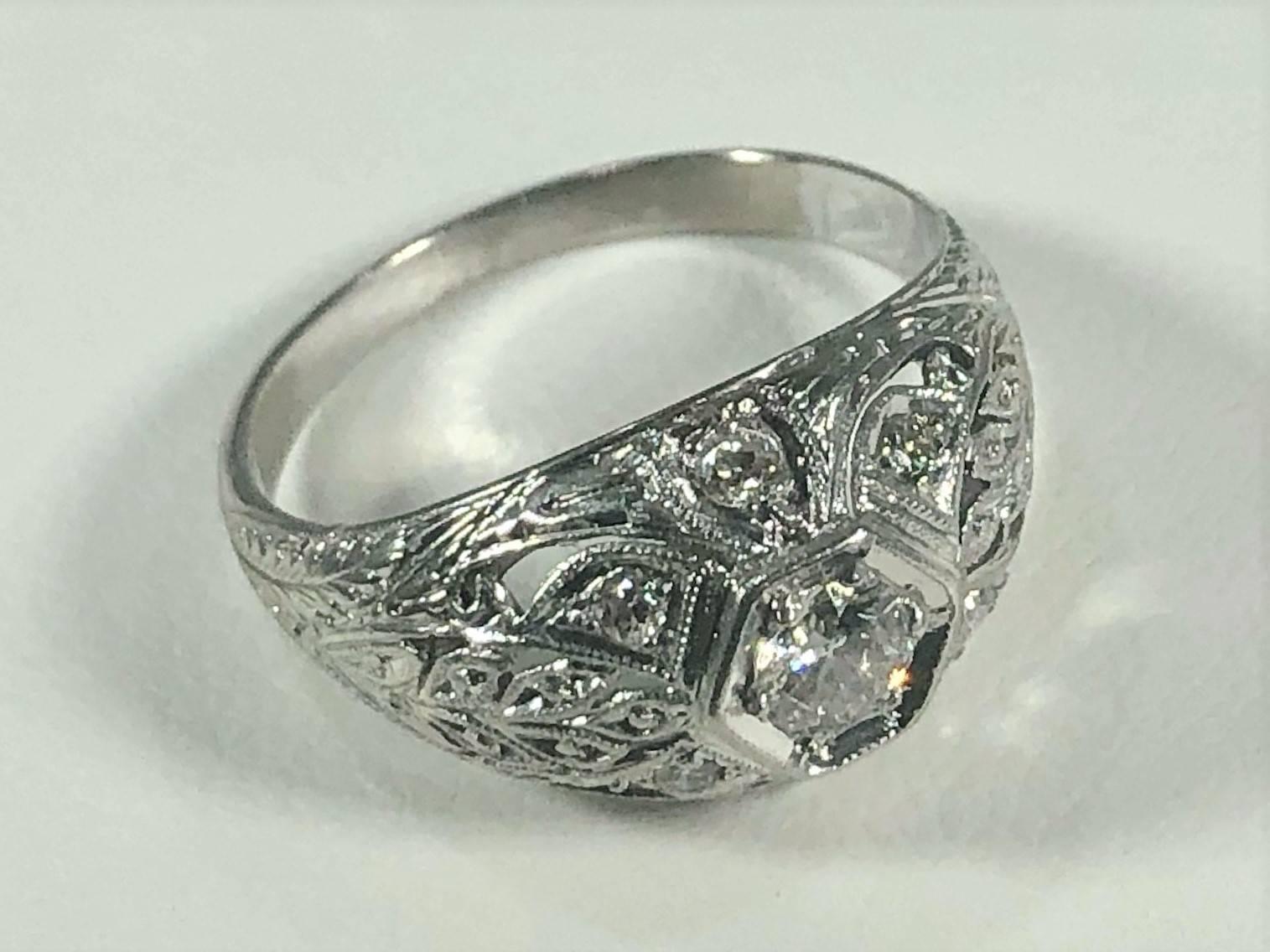 Art Deco Platinum and 18 Karat Gold European Cut Diamond Dome Engagement Ring For Sale 7