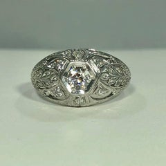 Art Deco Platinum and 18 Karat Gold European Cut Diamond Dome Engagement Ring