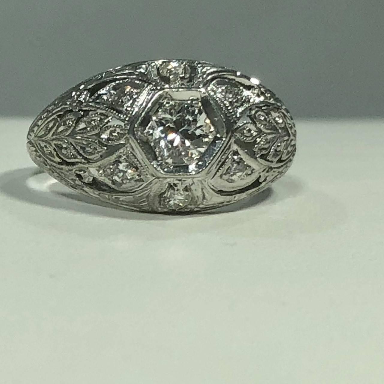 Art Deco Platinum and 18 Karat Gold European Cut Diamond Dome Engagement Ring For Sale 1