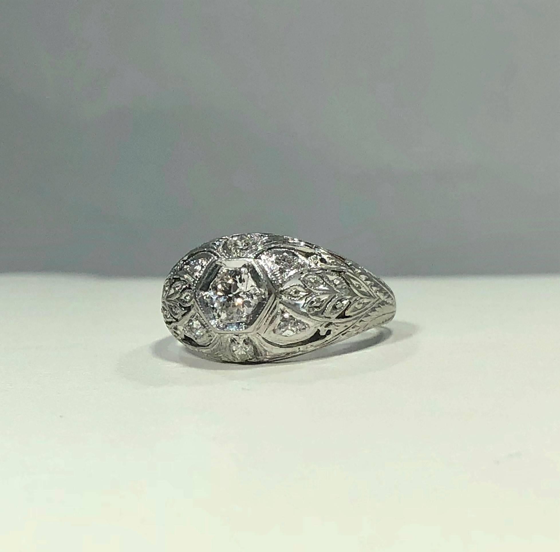 Art Deco Platinum and 18 Karat Gold European Cut Diamond Dome Engagement Ring For Sale 2