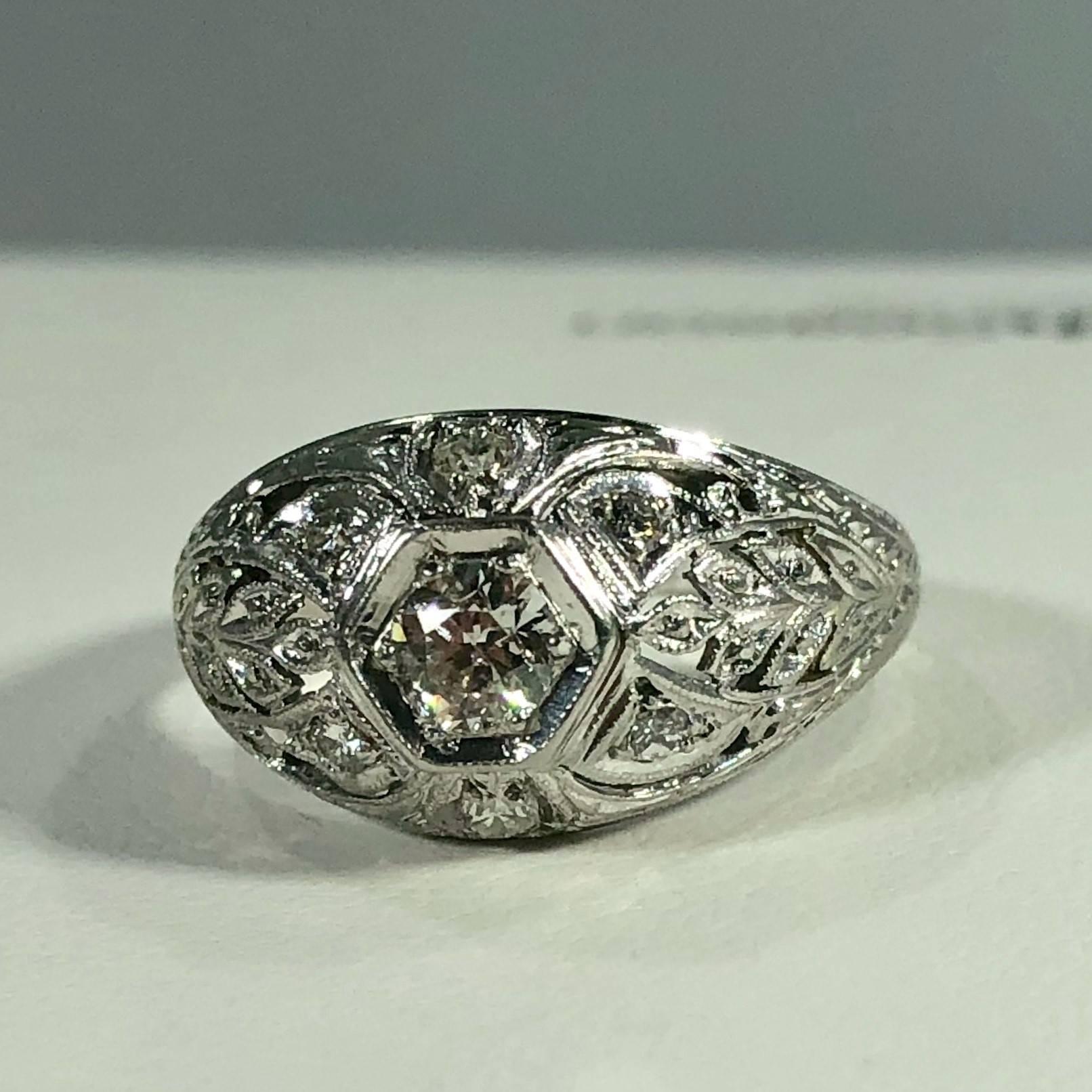 Art Deco Platinum and 18 Karat Gold European Cut Diamond Dome Engagement Ring For Sale 4