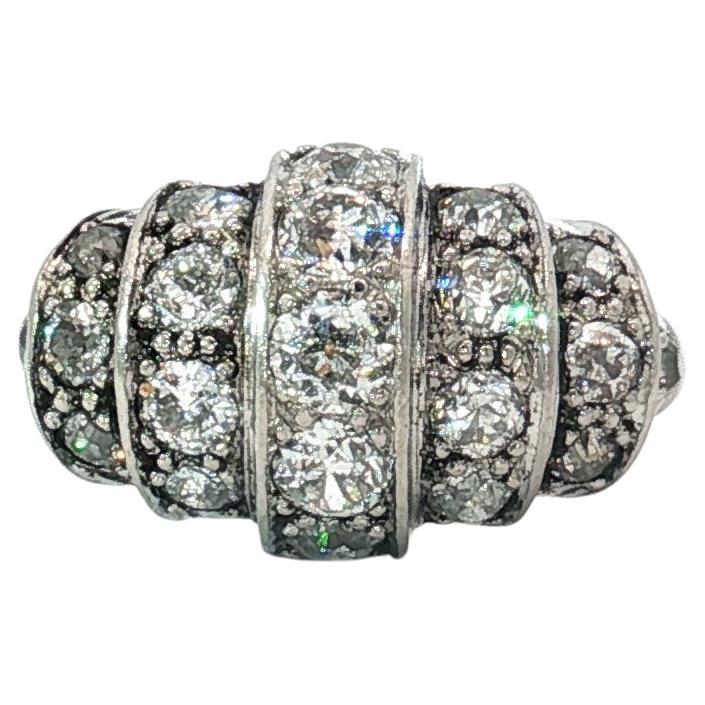 Art Deco Platinum and 18K Gold Old European Cut Diamond Bombé Ring, Circa 1925 For Sale