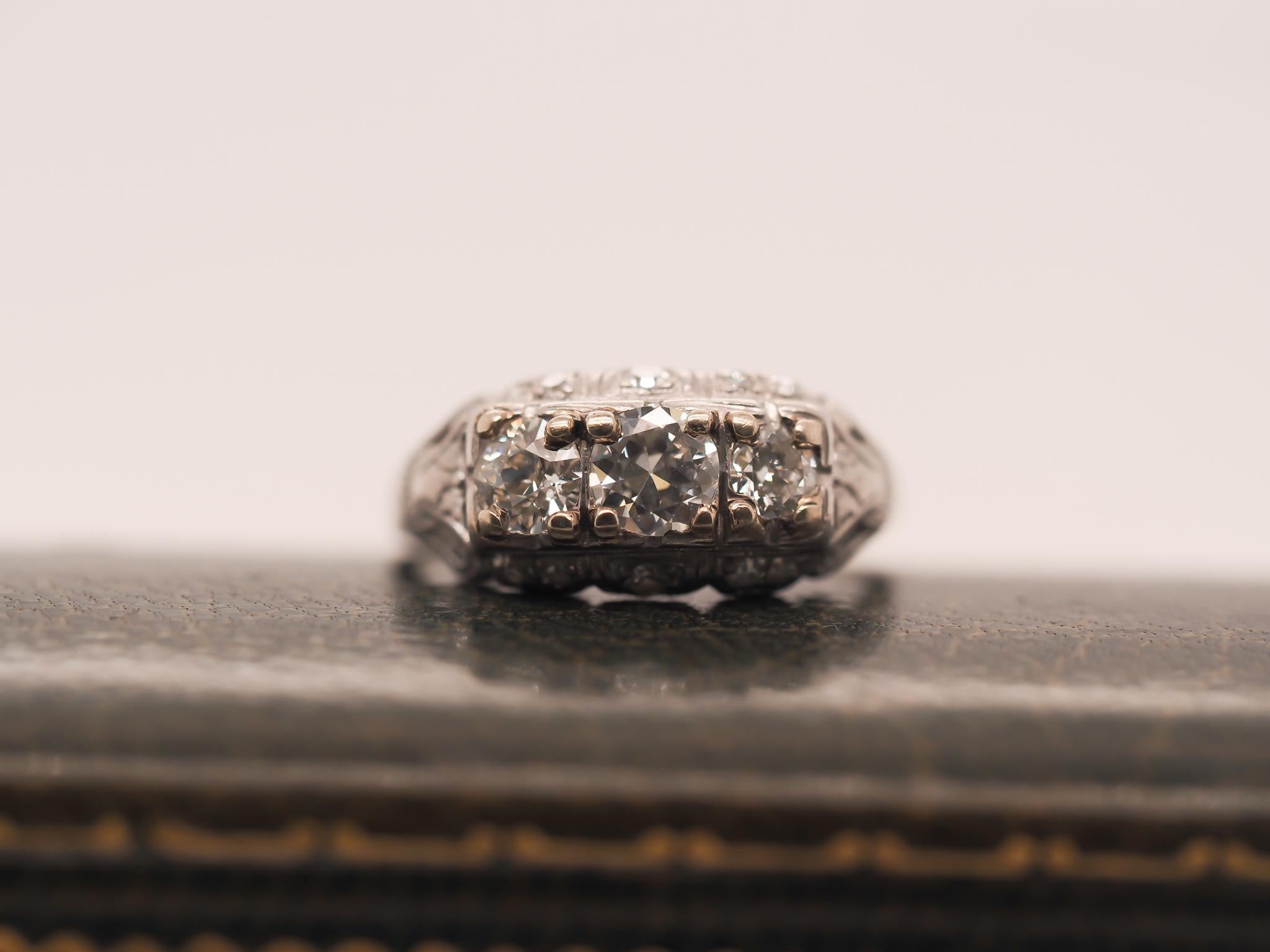 Year: 1930s
Item Details:
Ring Size: 6.5 (Sizable)
Metal Type: Platinum Head and 18K White Gold Shank [Hallmarked, and Tested]
Weight: 3.0 grams
Diamond Details: .80ct total weight, old European brilliant, G Color, VS Clarity
Band Width:
