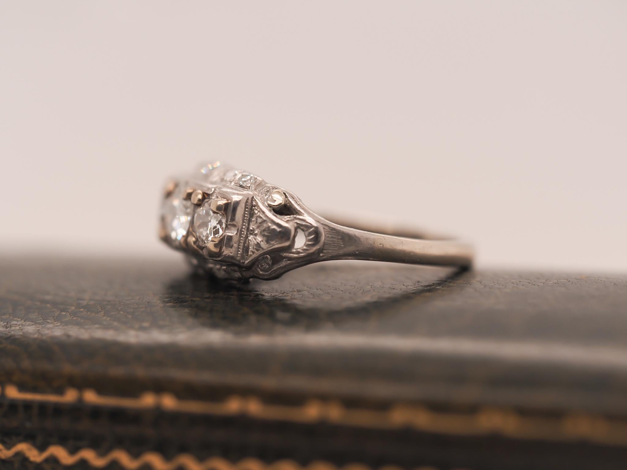 Art Deco Platinum and 18K White Gold Three Stone Old European Diamond Ring For Sale 3