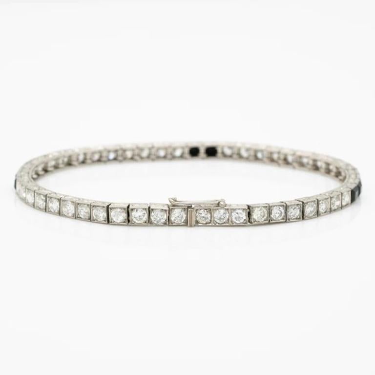 Art Deco Platinum And 4.0Ct Diamond And Onyx Line Bracelet C.1930S

Additional Information:
Period: Art Deco
Year: 1930s
Material: Platinum, 4.0ct. Diamond, Onyx
Weight: 16.4g
Length: 17.2cm/6.77 inches
Width: 2.8mm
Condition: Pristine Vintage