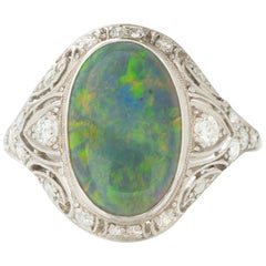 Art Deco Platinum and Diamond and 2.8 Carat Black Opal Ring