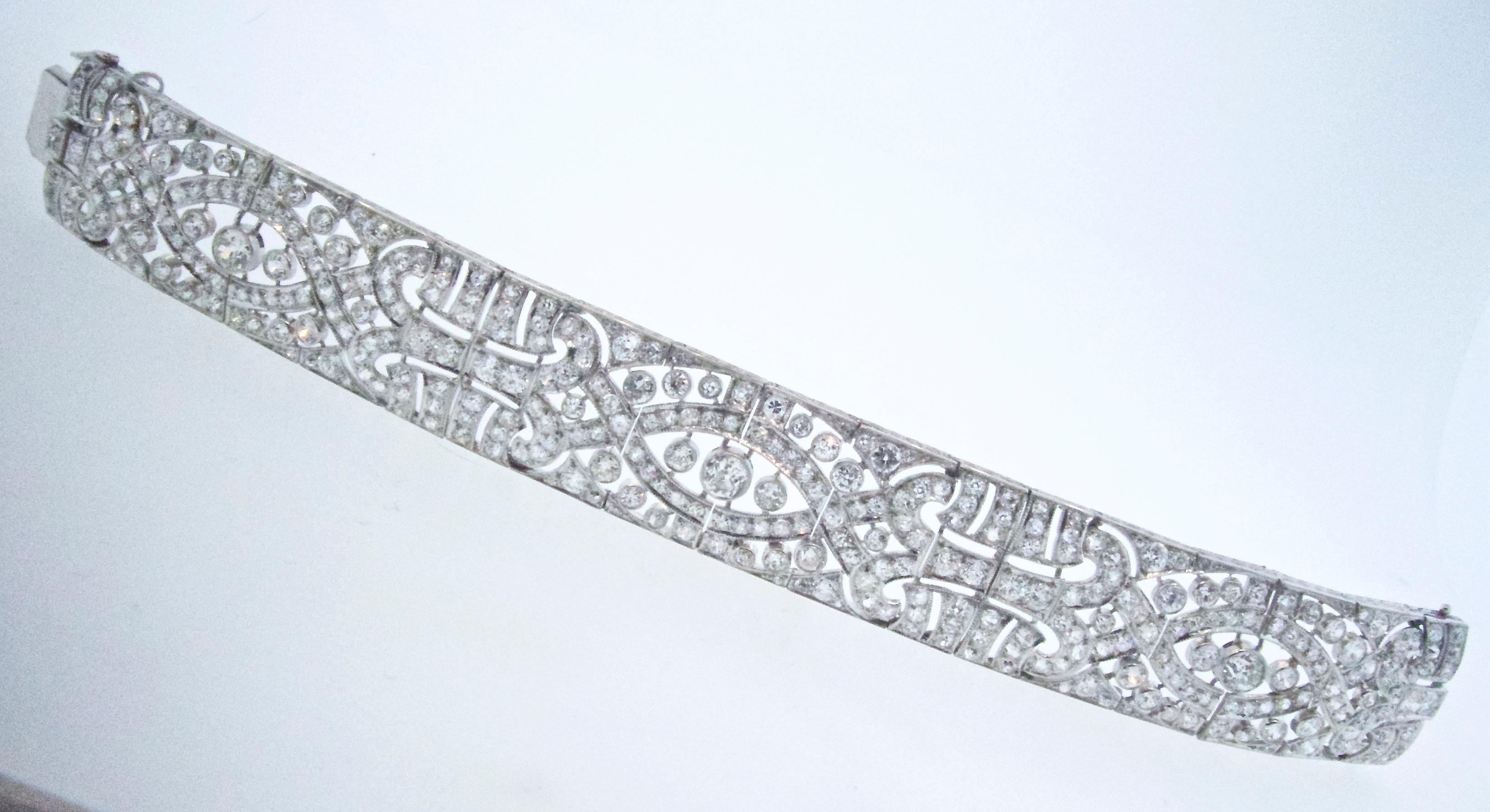 Diamond and platinum Art Deco wide bracelet with 348 older European cut diamonds all well cut and well matched and weighing approximately 22.5 cts.  All the European cut diamonds are well matched, near colorless (H) and very slightly included (VS).