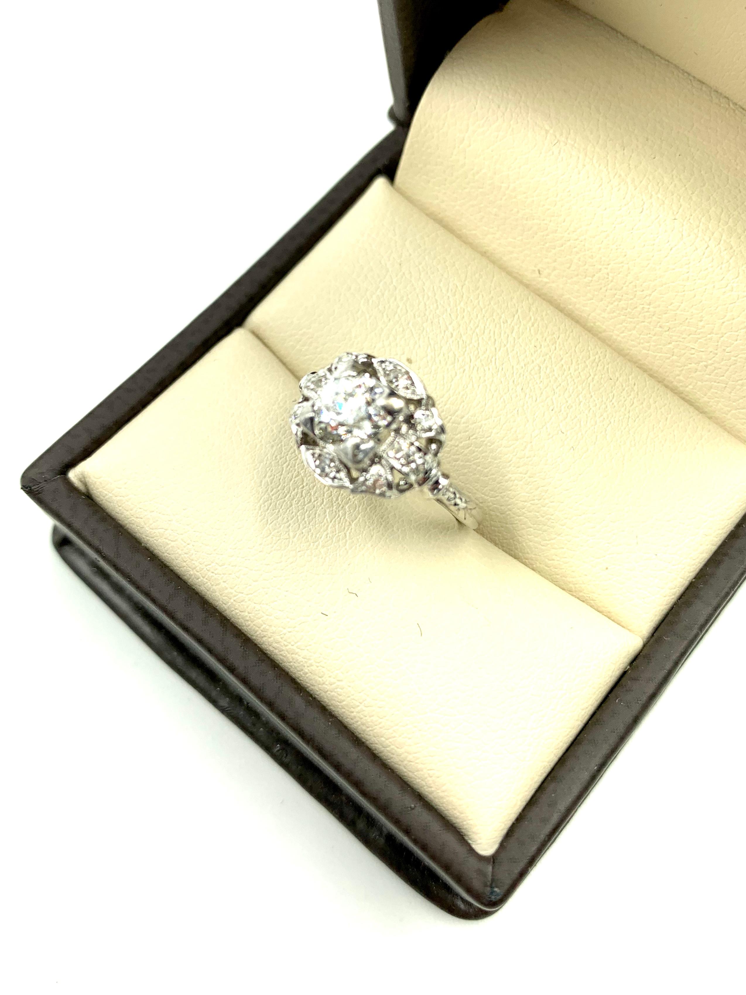 Round Cut Fine Art Deco Period .95TCW Diamond Platinum Ring For Sale