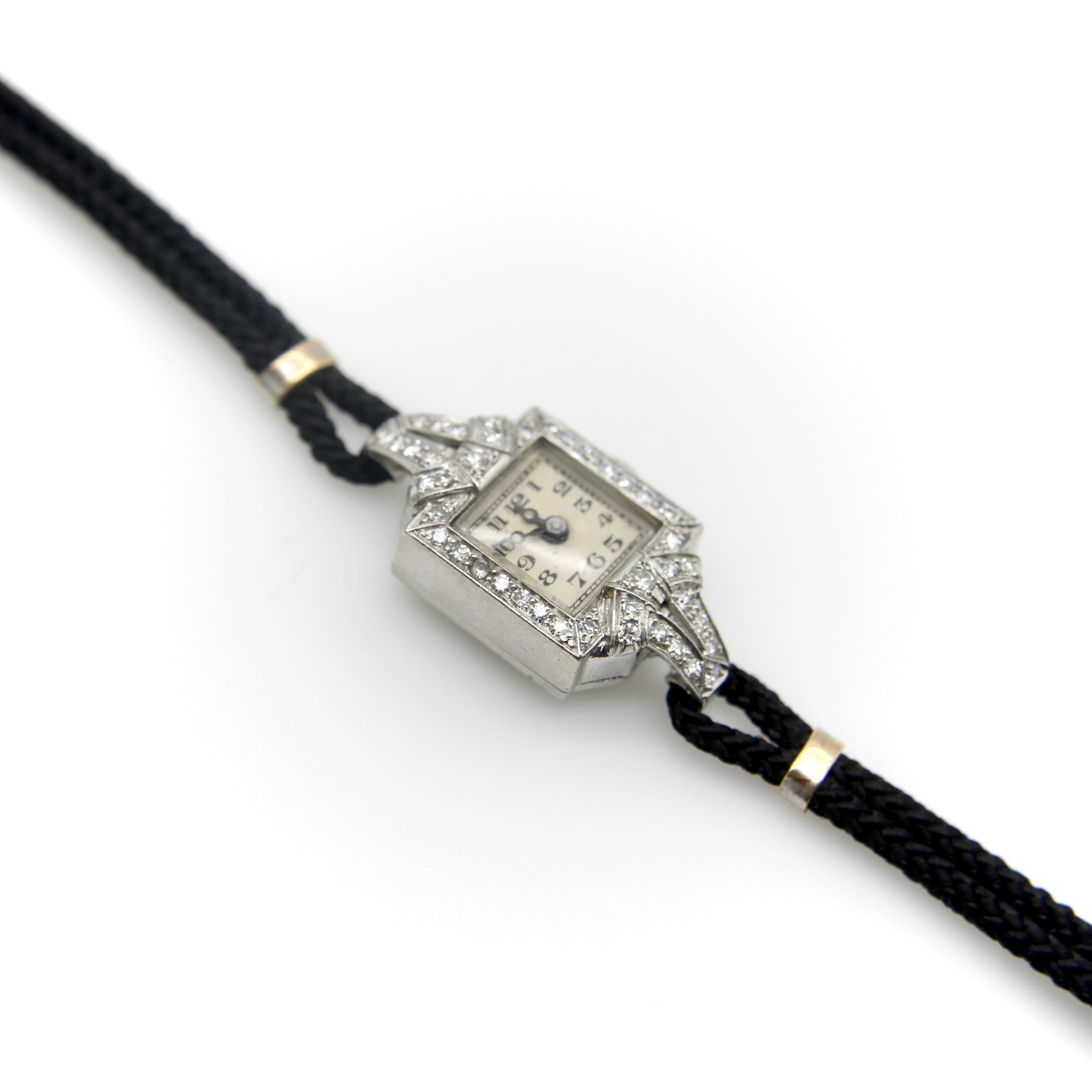 Taille simple Montre-bracelet Art déco en platine et diamants par Concord en vente