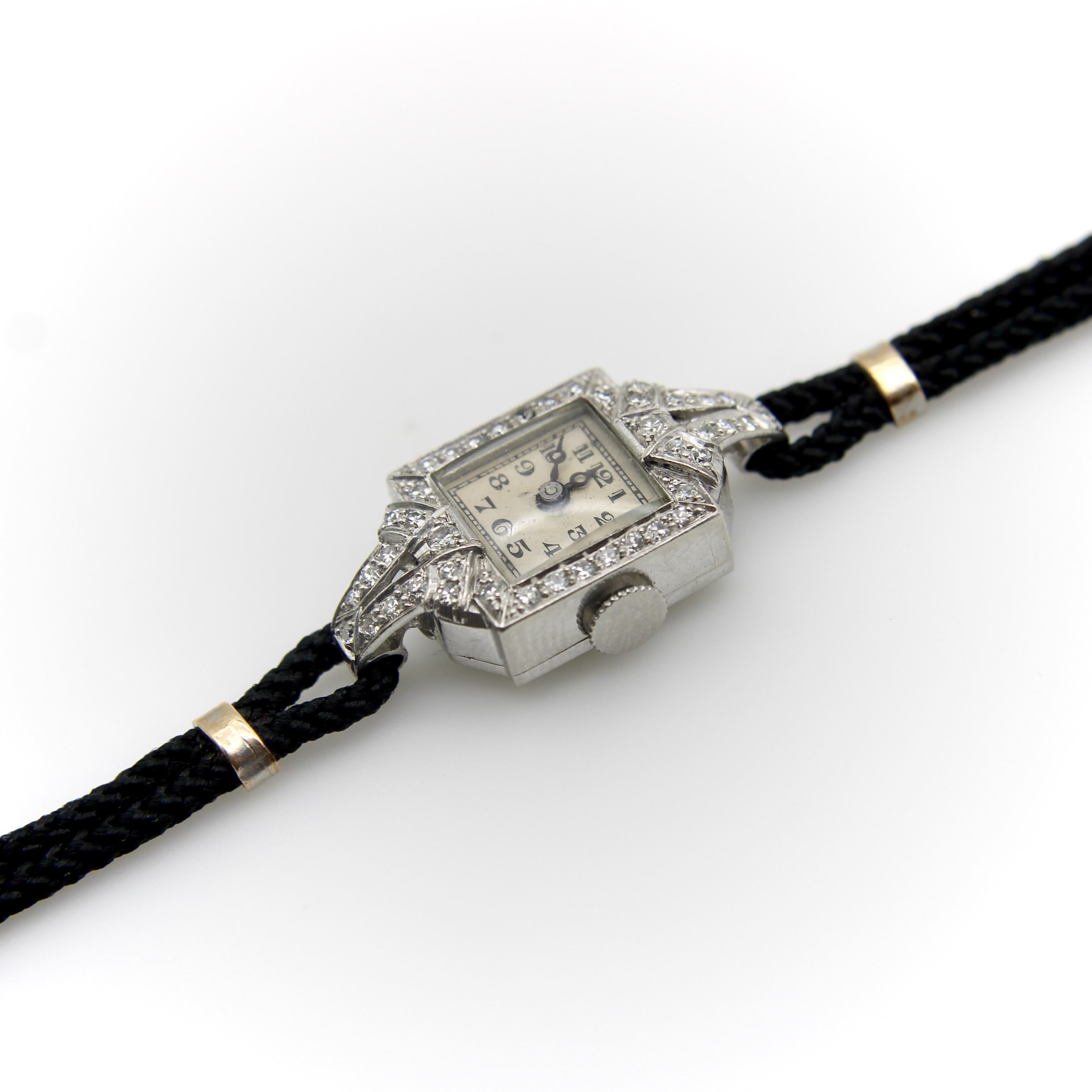 Montre-bracelet Art déco en platine et diamants par Concord Bon état - En vente à Venice, CA